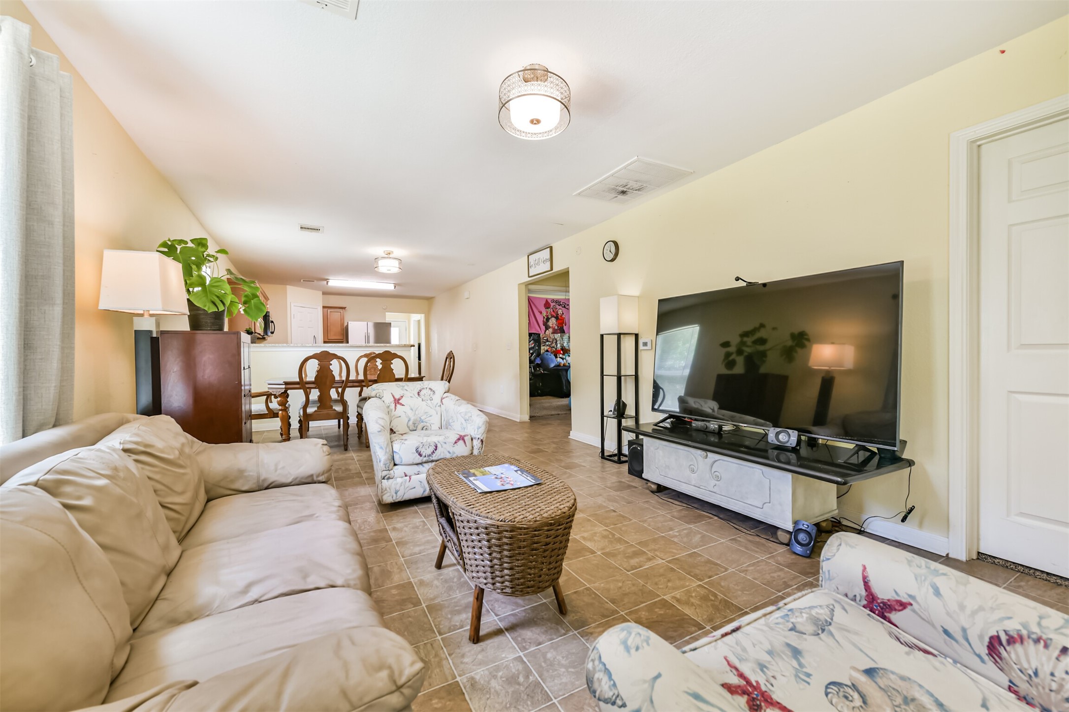 Living areas with tile flooring.