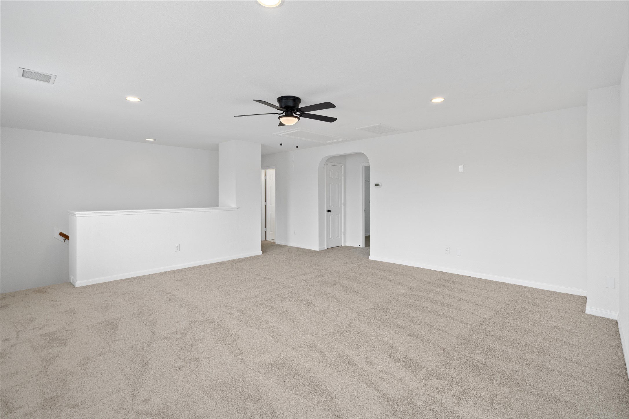 Game Room / Flex Space  Alternate view emphasizes the open layout, generous floor area, recessed lighting, and convenient connection to the surrounding upstairs rooms.