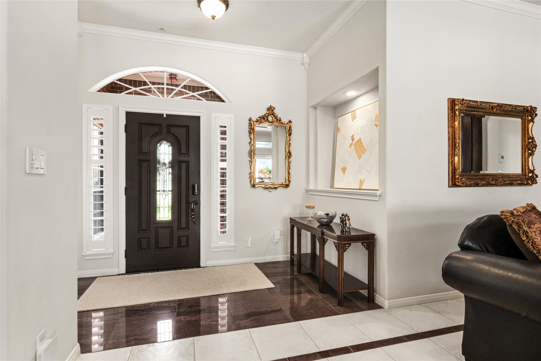 Elegant Entryway with custom tile
