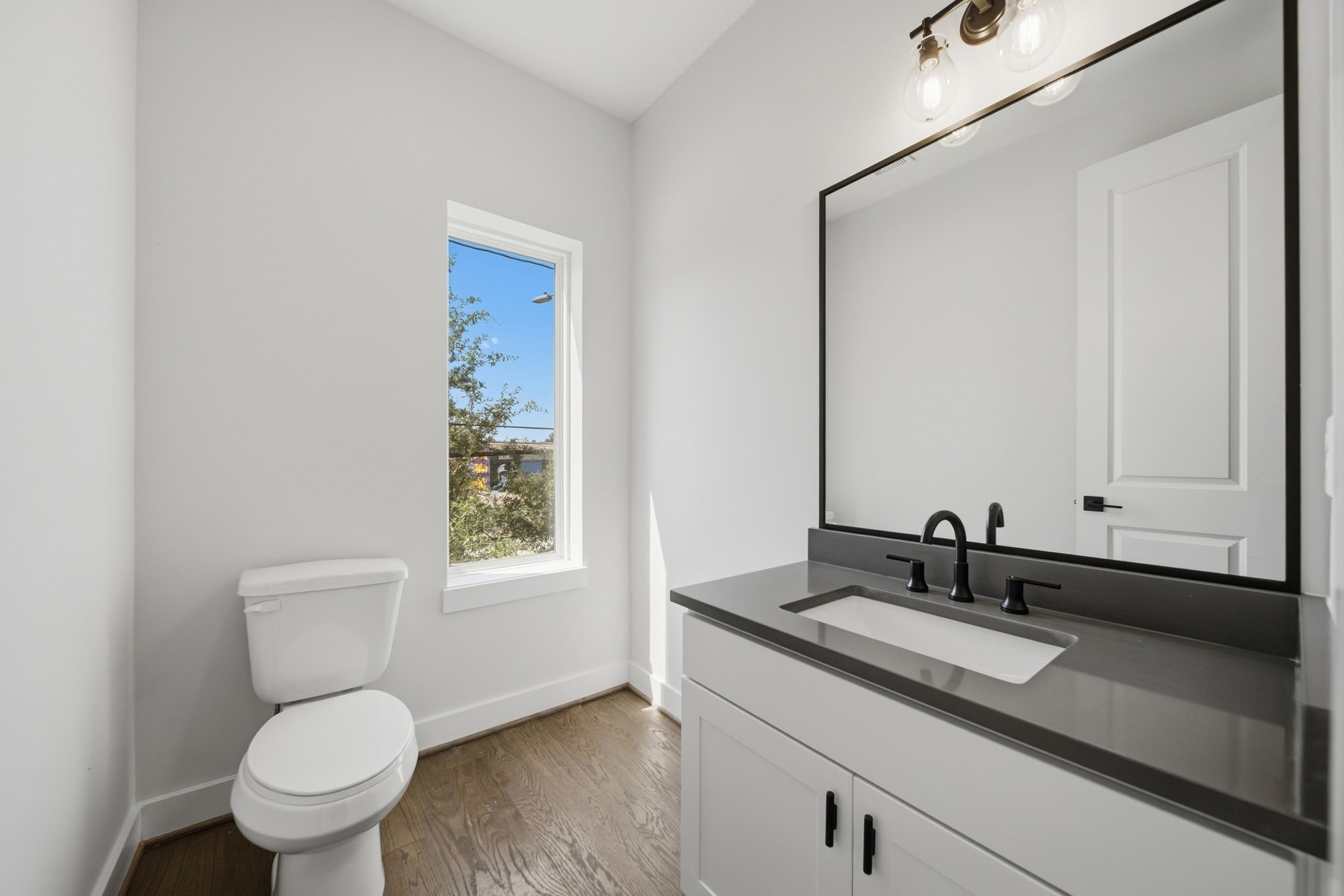 Half bath located on second floor for easy guest access.