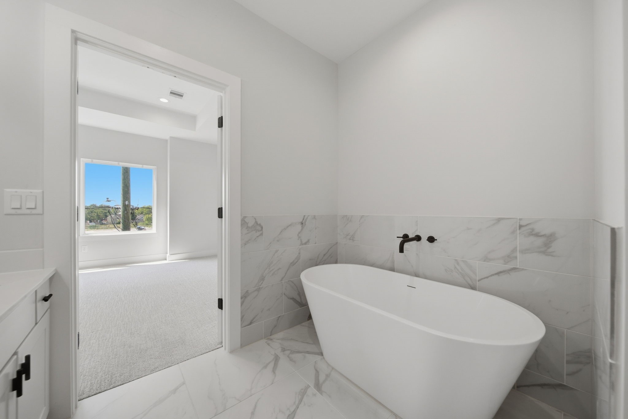 Relaxing soaking tub in primary bathroom