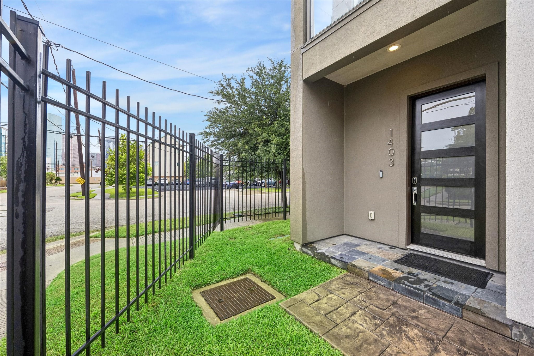 Before you even step inside, this home starts showing off with a gated entry, attached 2-car garage with epoxy flooring, and a long list of unique features waiting inside. Three private suites, two powder baths, a bonus room, sunken living area, floating staircase, bamboo flooring, picture windows with custom shades, two balconies, and a rooftop wraparound deck all come together for a home that feels anything but ordinary.