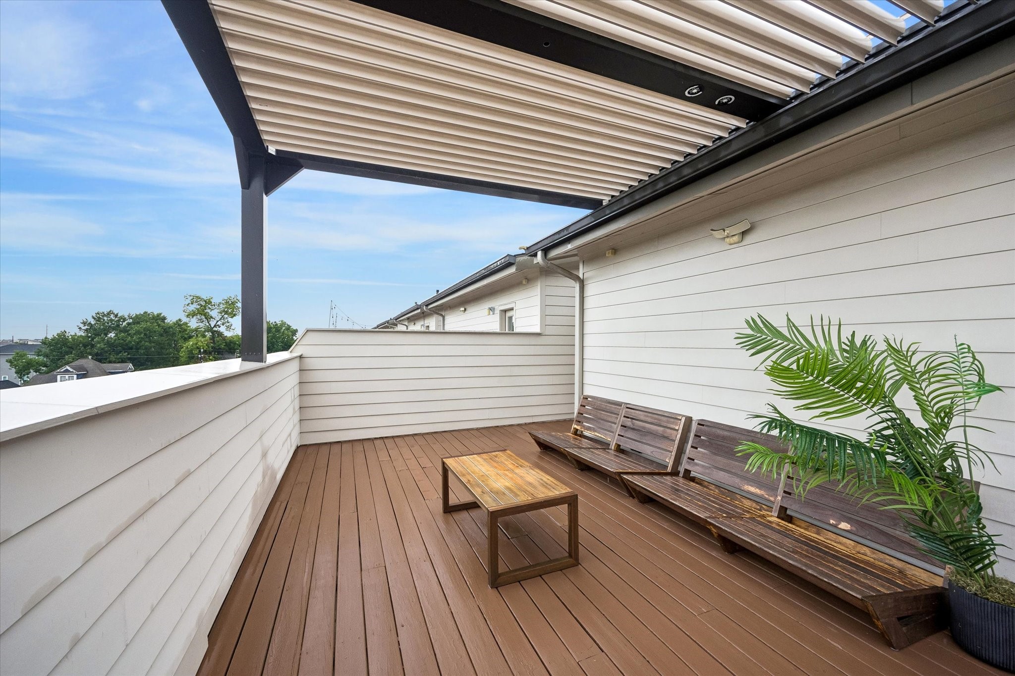 The rooftop wraparound deck is a standout feature, giving you an incredible outdoor space to relax, entertain, and take in the city from above. With plenty of room to spread out and a shaded section for added comfort, it feels like your own private urban retreat.