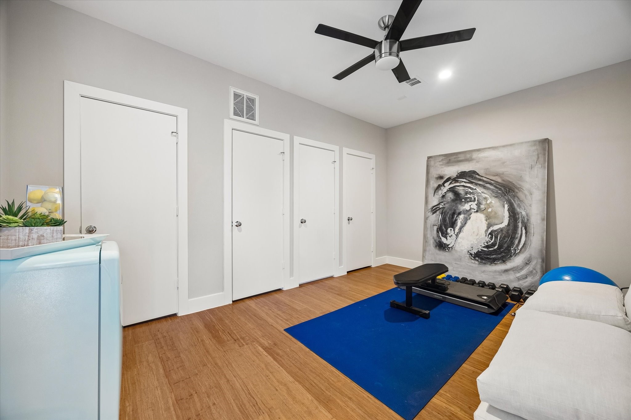 The upper-level bonus space adds another layer of flexibility, with room for a home office, fitness area, craft room, or creative studio. With a nearby powder bath and easy access to the rooftop deck, it's also a fun spot to keep the party going.