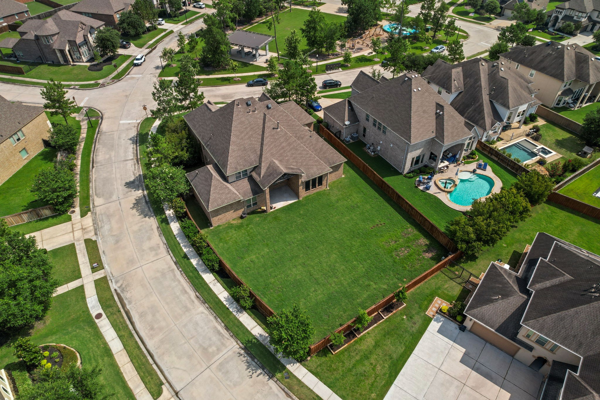 Another view of the large pool sized backyard.