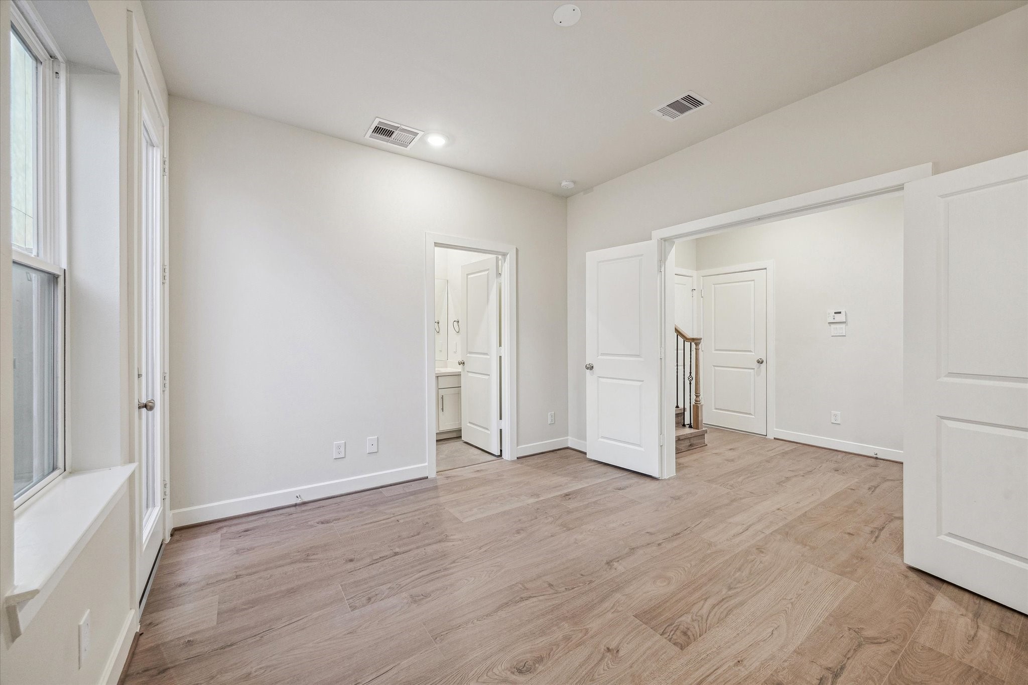 Representative photo showing the communitys model home secondary bedroom. Layout and selections may vary.