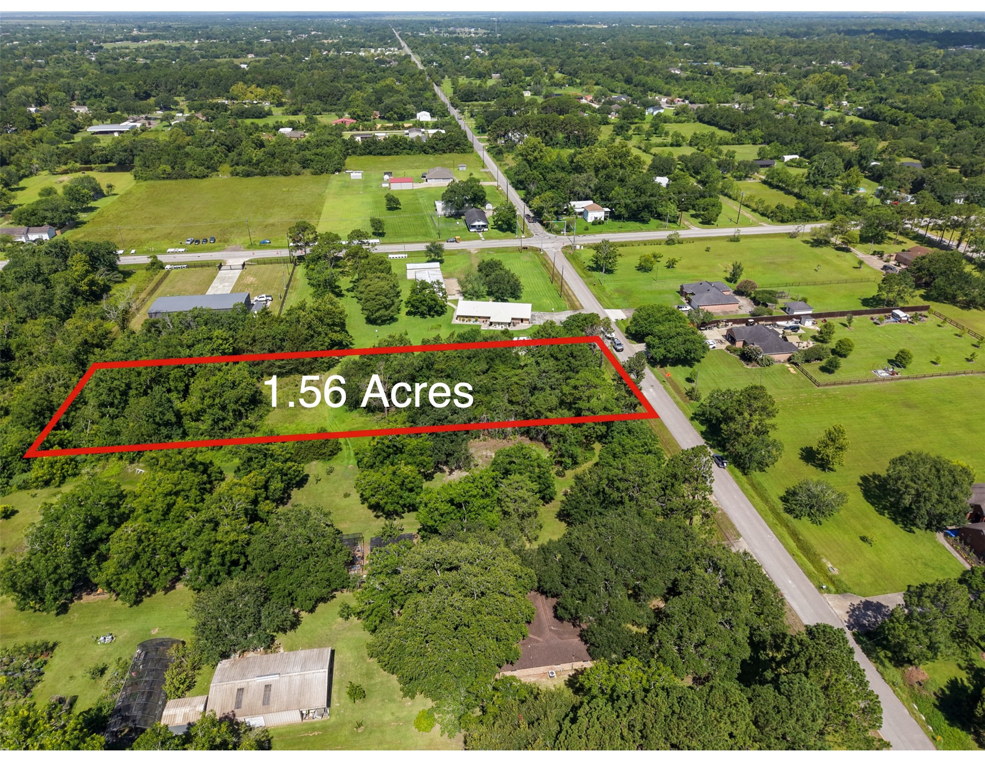 Outlined from above, the entire 1.56-acre tract can be appreciated in a single view. Approximately 67,997 sq. ft. extends from the 111' frontage deep into the wooded property, creating an impressive footprint for future plans. With no HOA, mature trees and utilities including gas, electric and cable available at the street, the property offers a compelling starting point for a thoughtfully planned Santa Fe homesite.