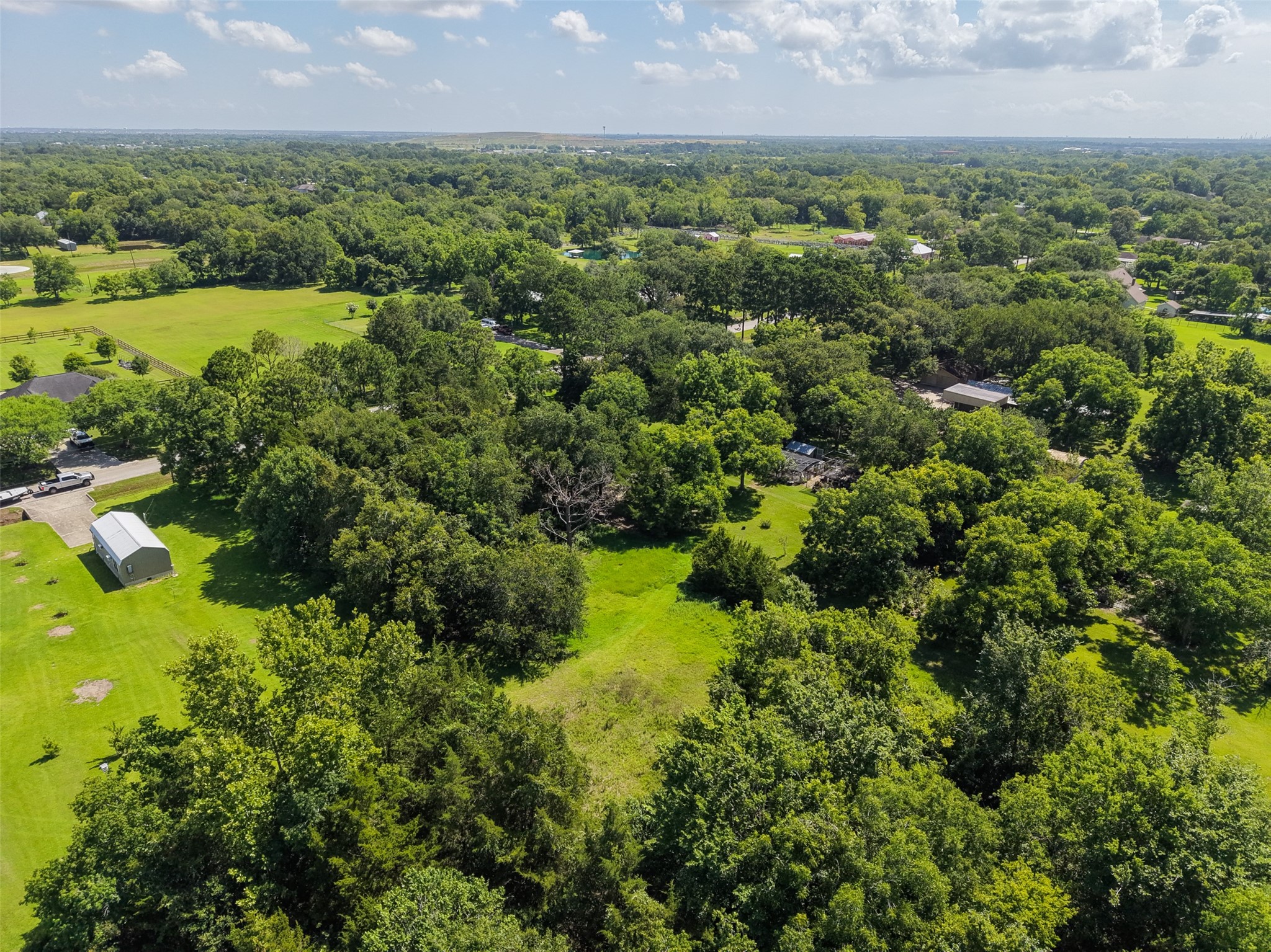 Country surroundings meet everyday convenience in this Santa Fe location. The property offers 1.56 acres of wooded and open space near FM 646, while Highway 6 provides access to groceries and an assortment of local restaurants. Nearby options include Taquera Flores for Mexican favorites and Lorenzo's Pizza for pizza and casual takeout.