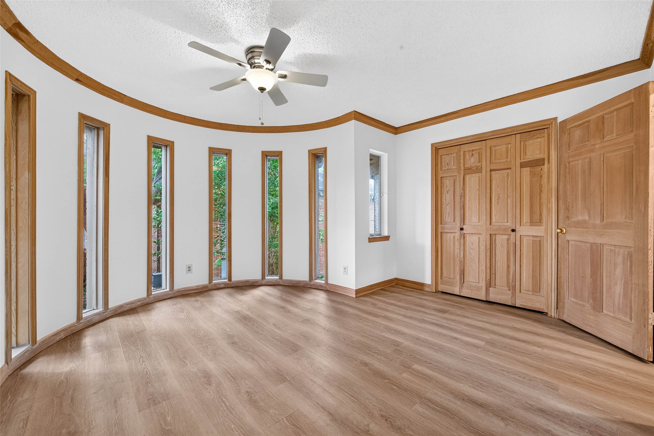 This unique round room features elegant vertical windows