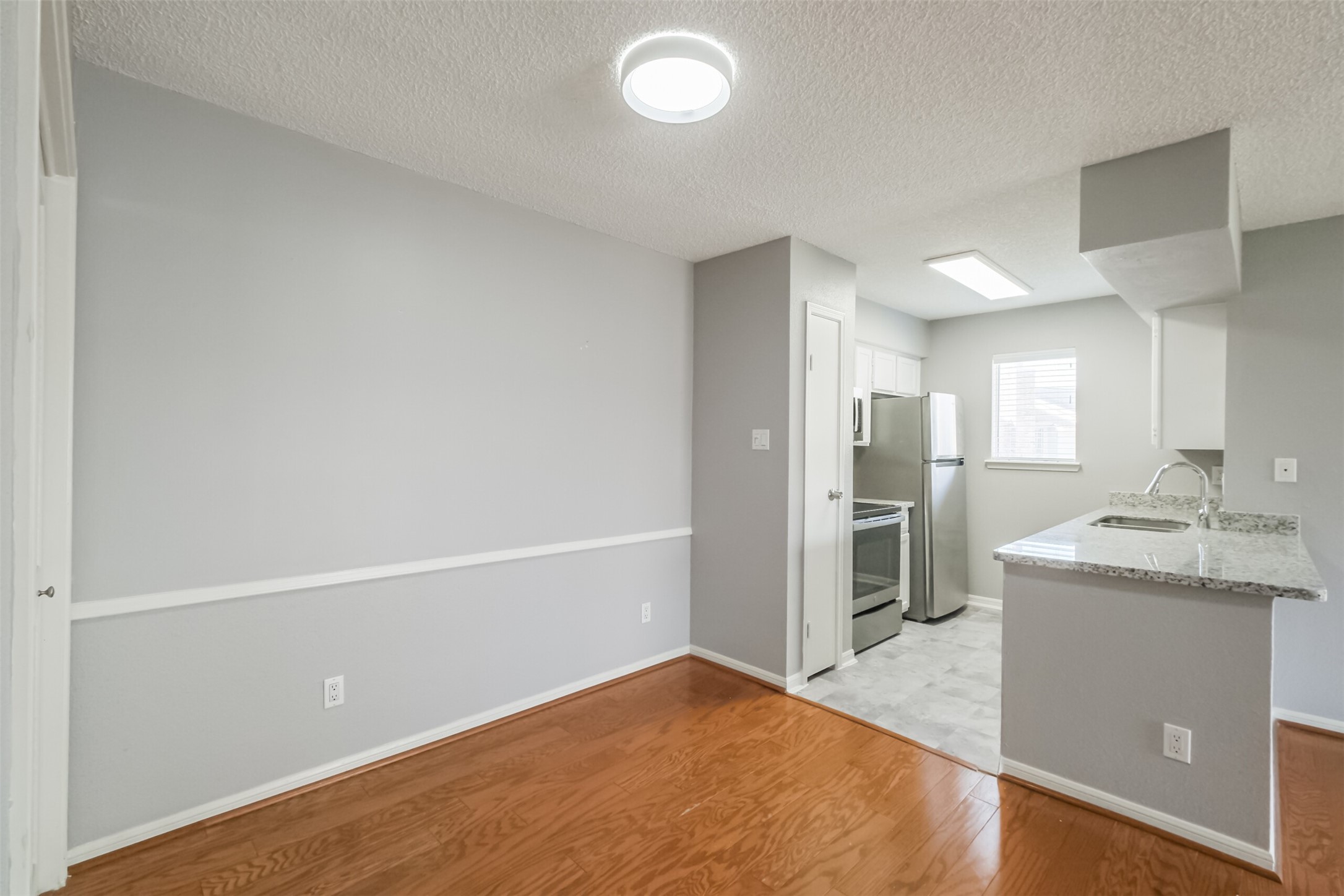 Bright dining area located just off the kitchenperfect for everyday meals and entertaining!