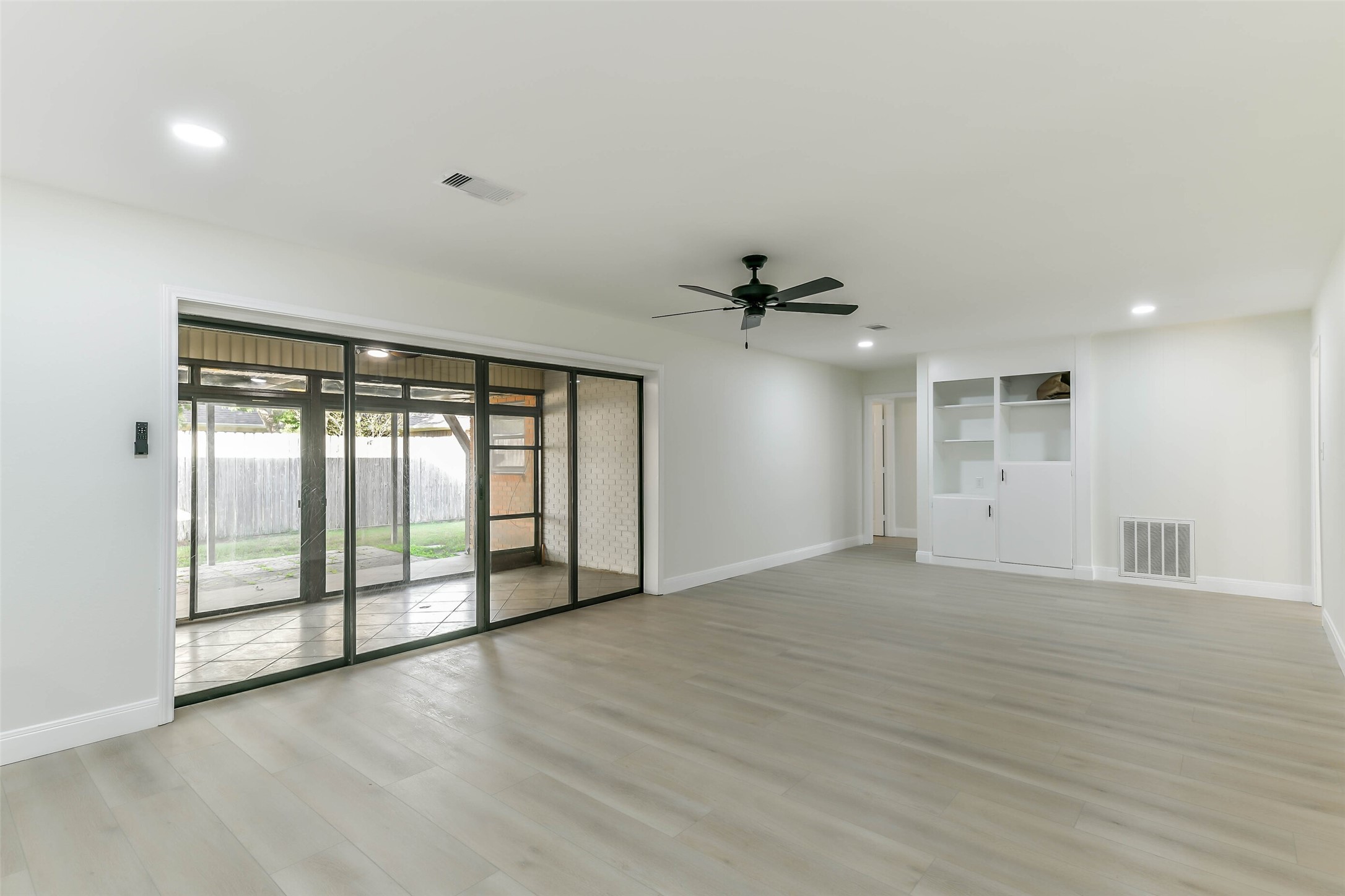 Living Room with Sunroom Access