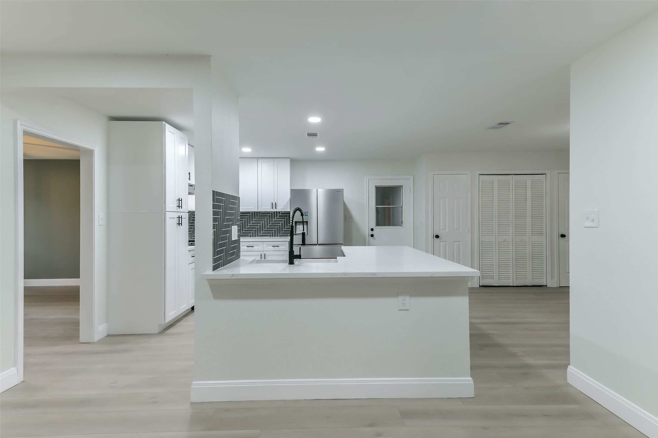 Kitchen with island with sink and dishwasher all the appliances are BRAND NEW!
