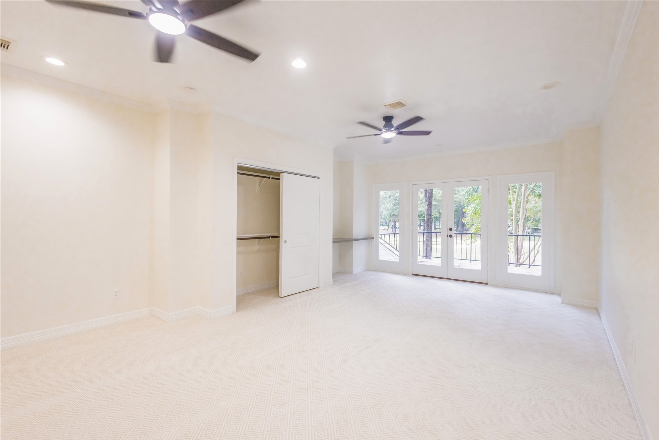 Secondary bedroom upstairs with its own balcony