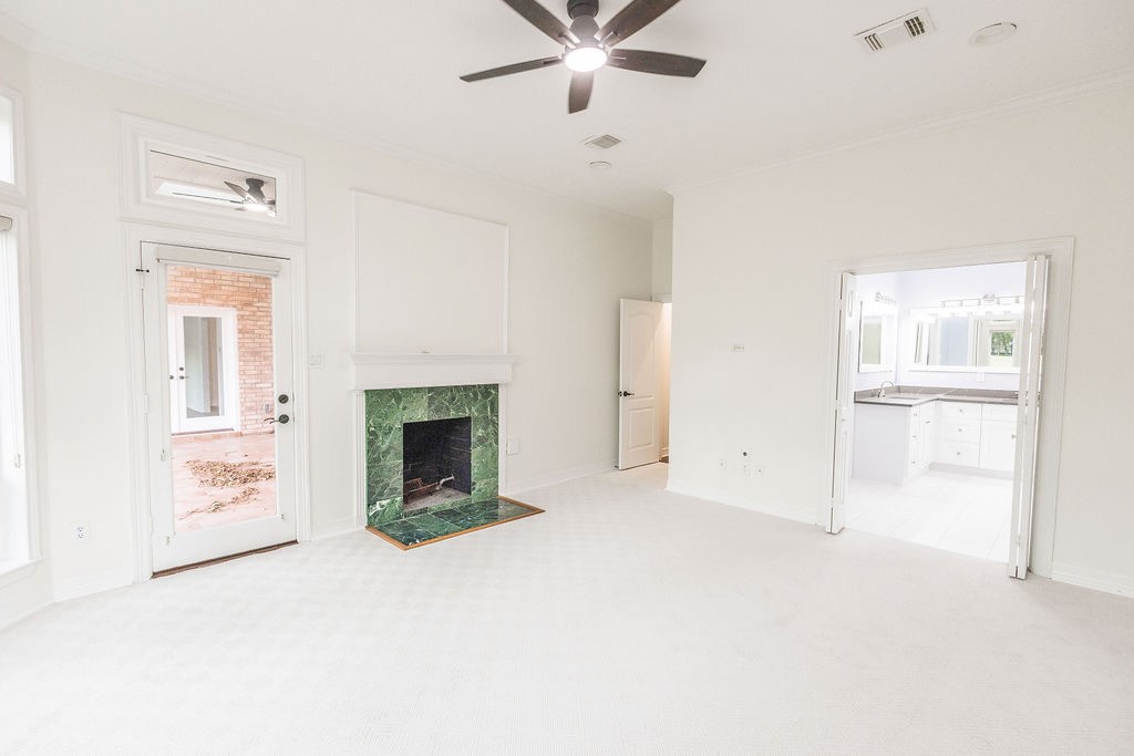 Primary bedroom has a door to step outside on the back porch to enjoy your morning coffee