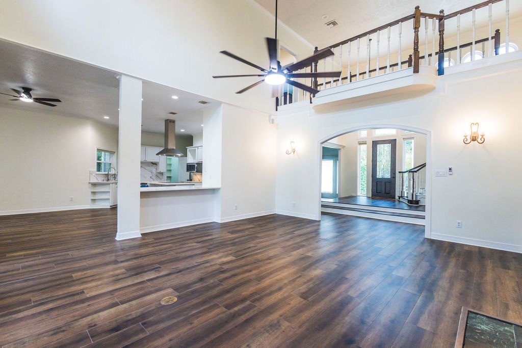Living room has two story high ceilings making it feel light and airy