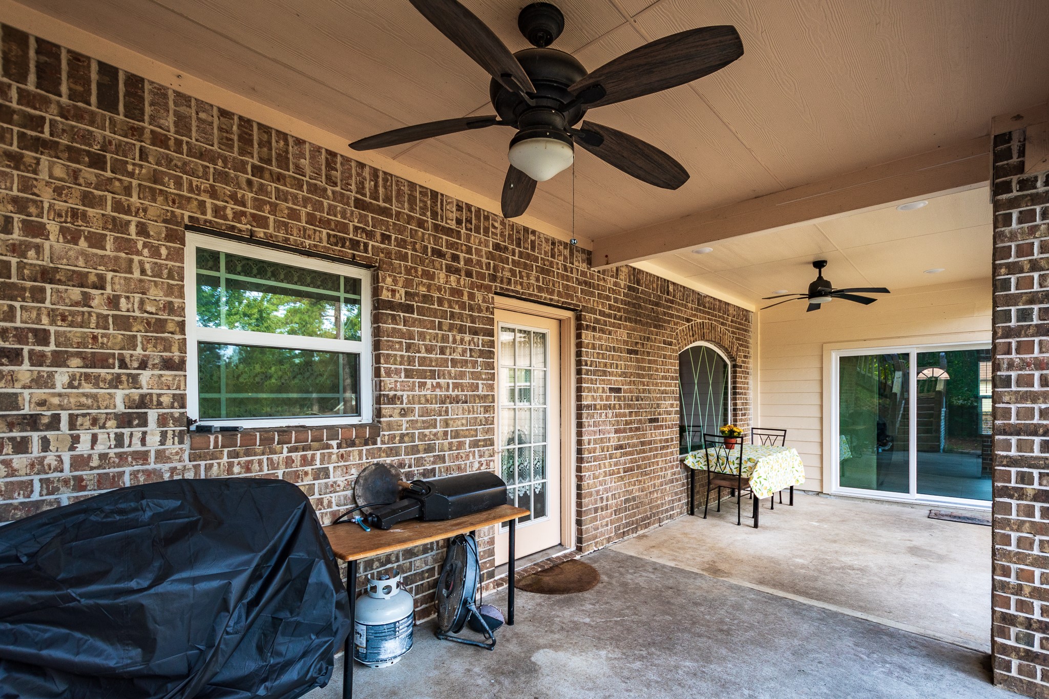Outdoor covered patio off the main kitchen and the nexgen home.
