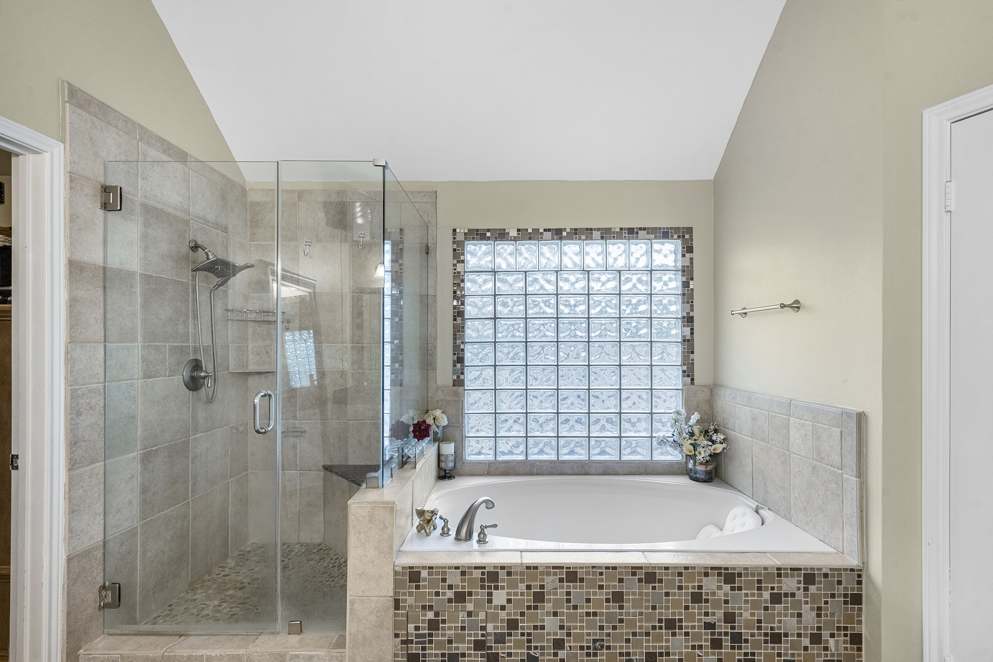Soaking tub and separate shower.