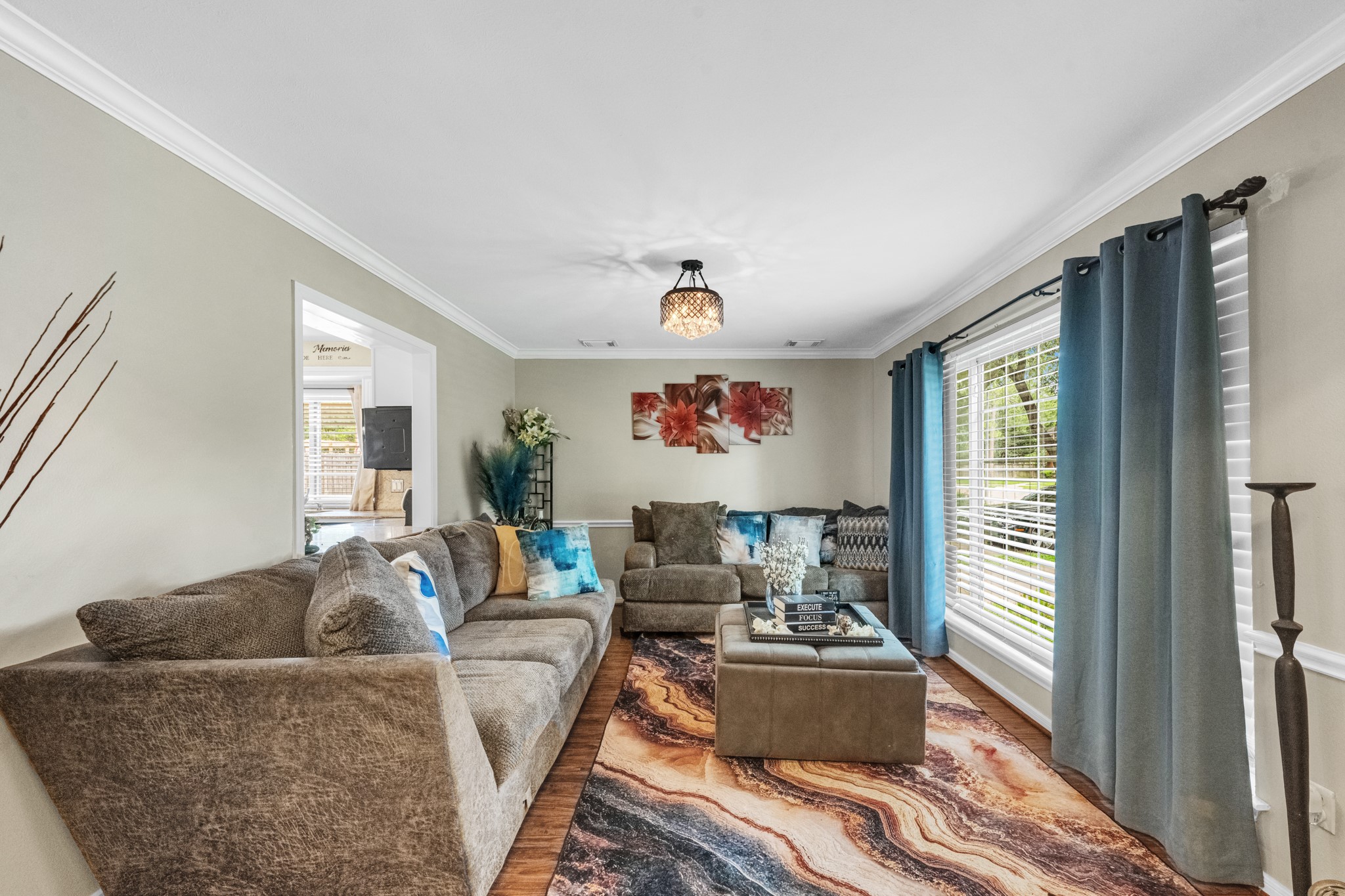 Currently used as a sitting area, this versatile space can easily adapt to fit your needs  whether as a home office, playroom, reading nook, workout space, or additional entertaining area.