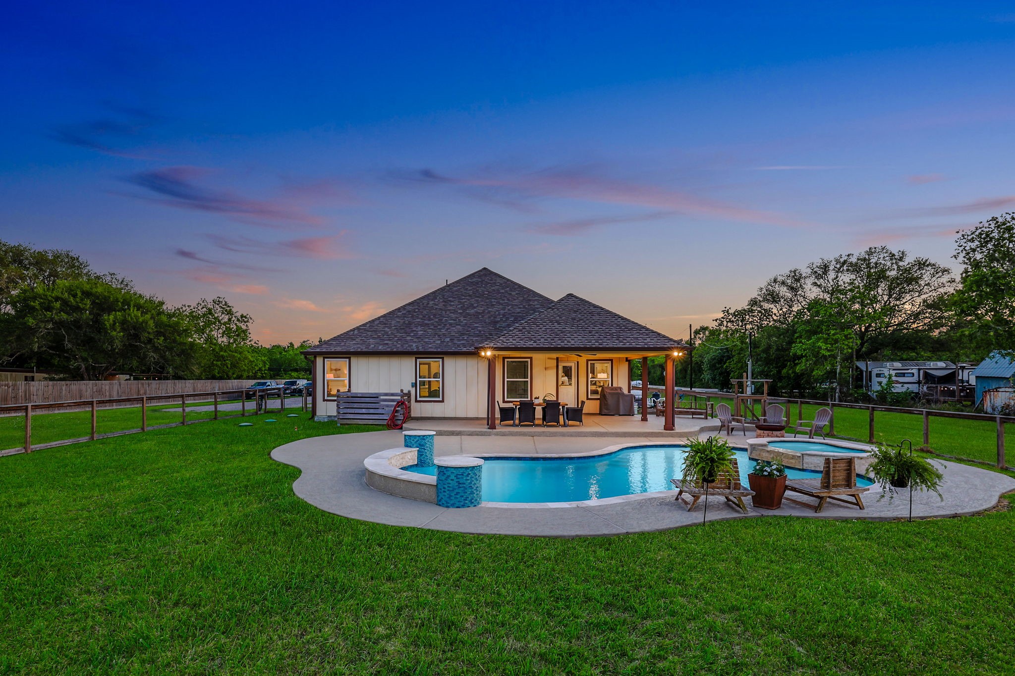 The yard area around the pool has been fully fenced