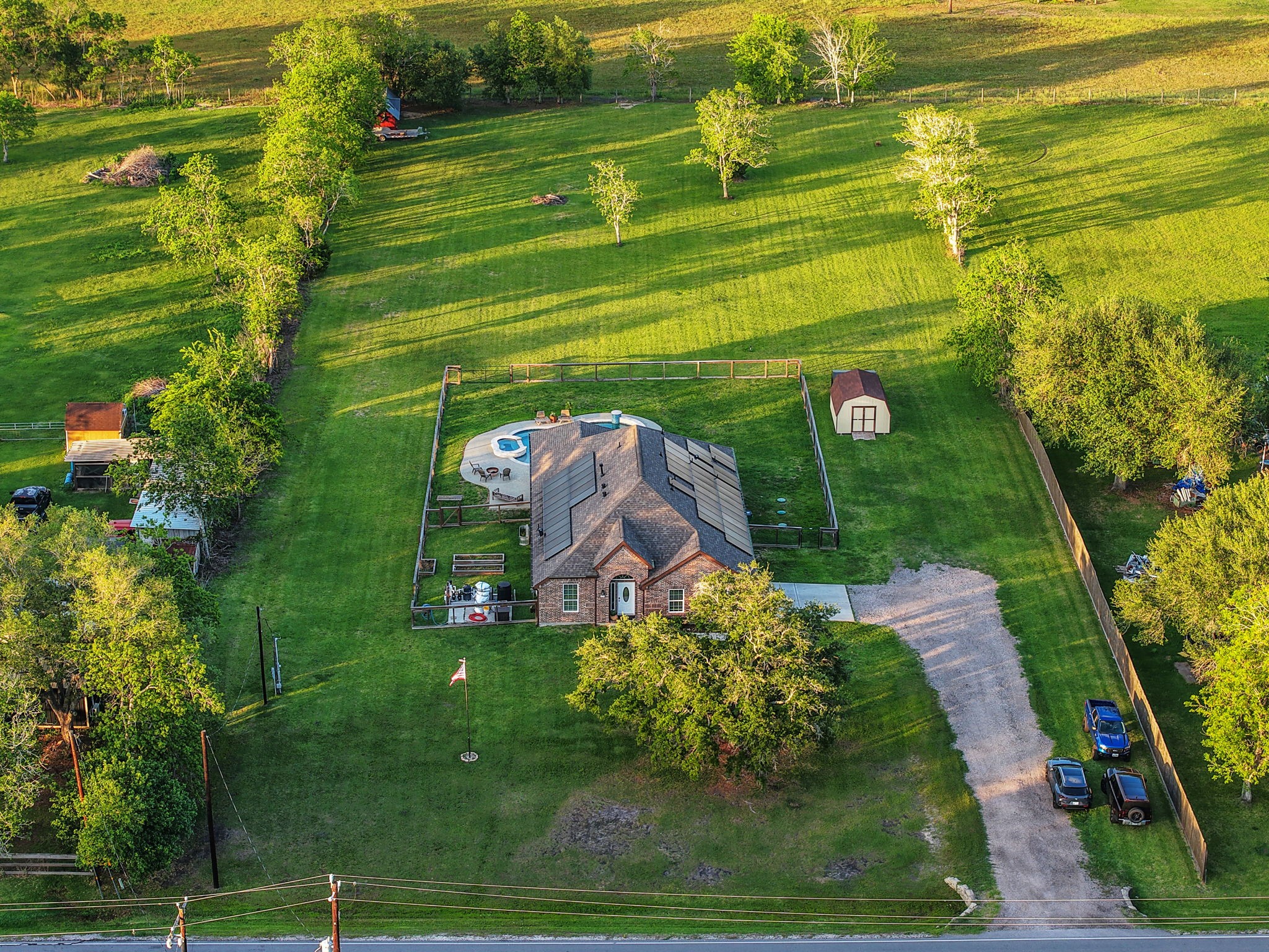 Charming home on a 2 acre lot, featuring a well-maintained yard, private pool, and ample parking. Ideal for those seeking tranquility and outdoor enjoyment.