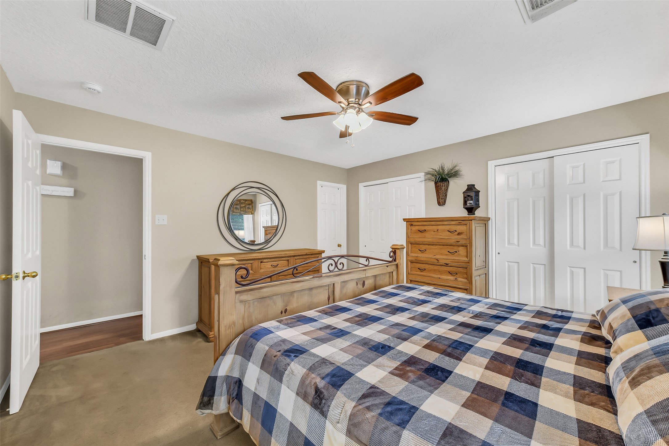 This bedroom has dual closets plus a walk-in.