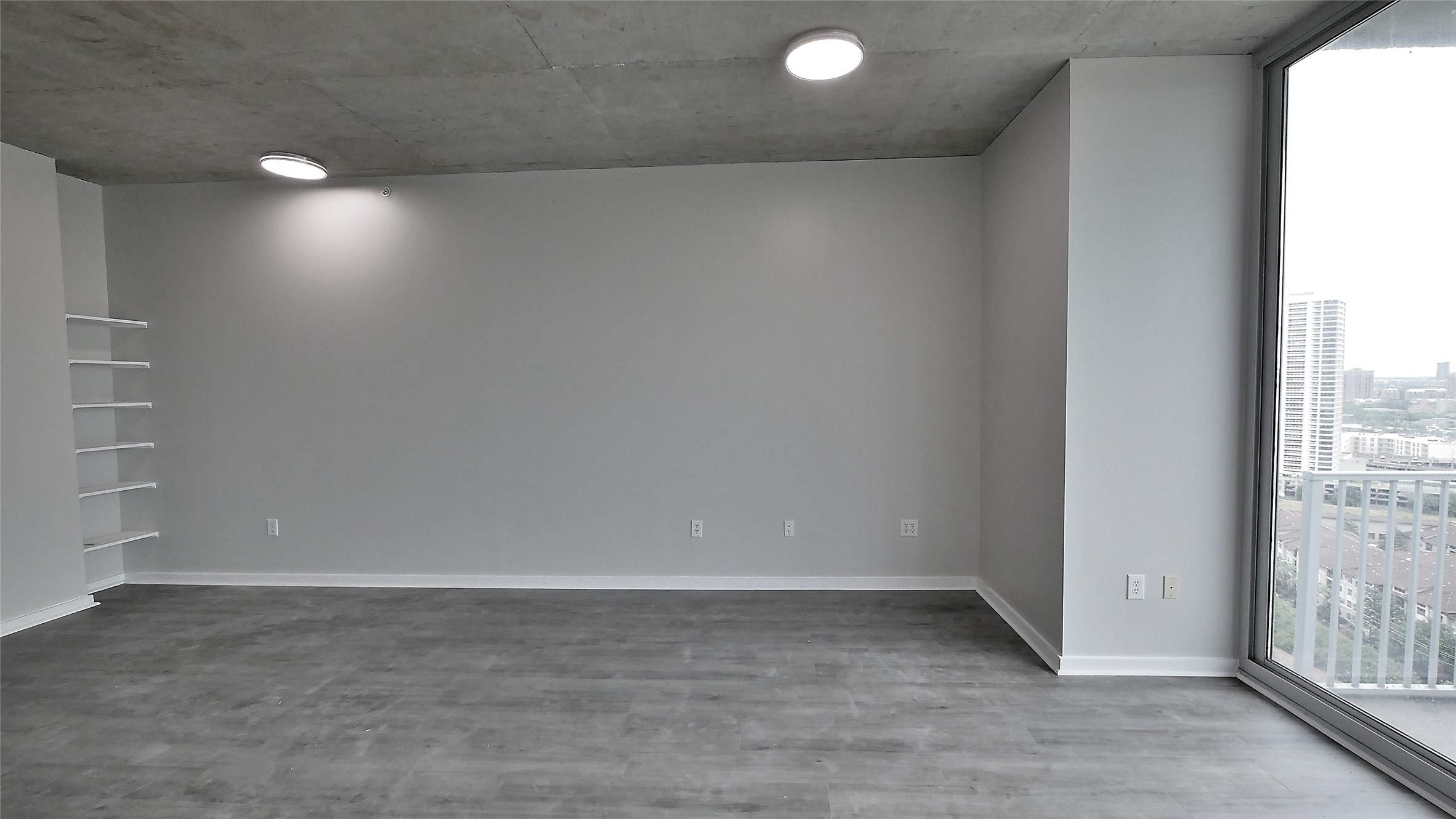 Living Room with large floor to ceiling sliding
