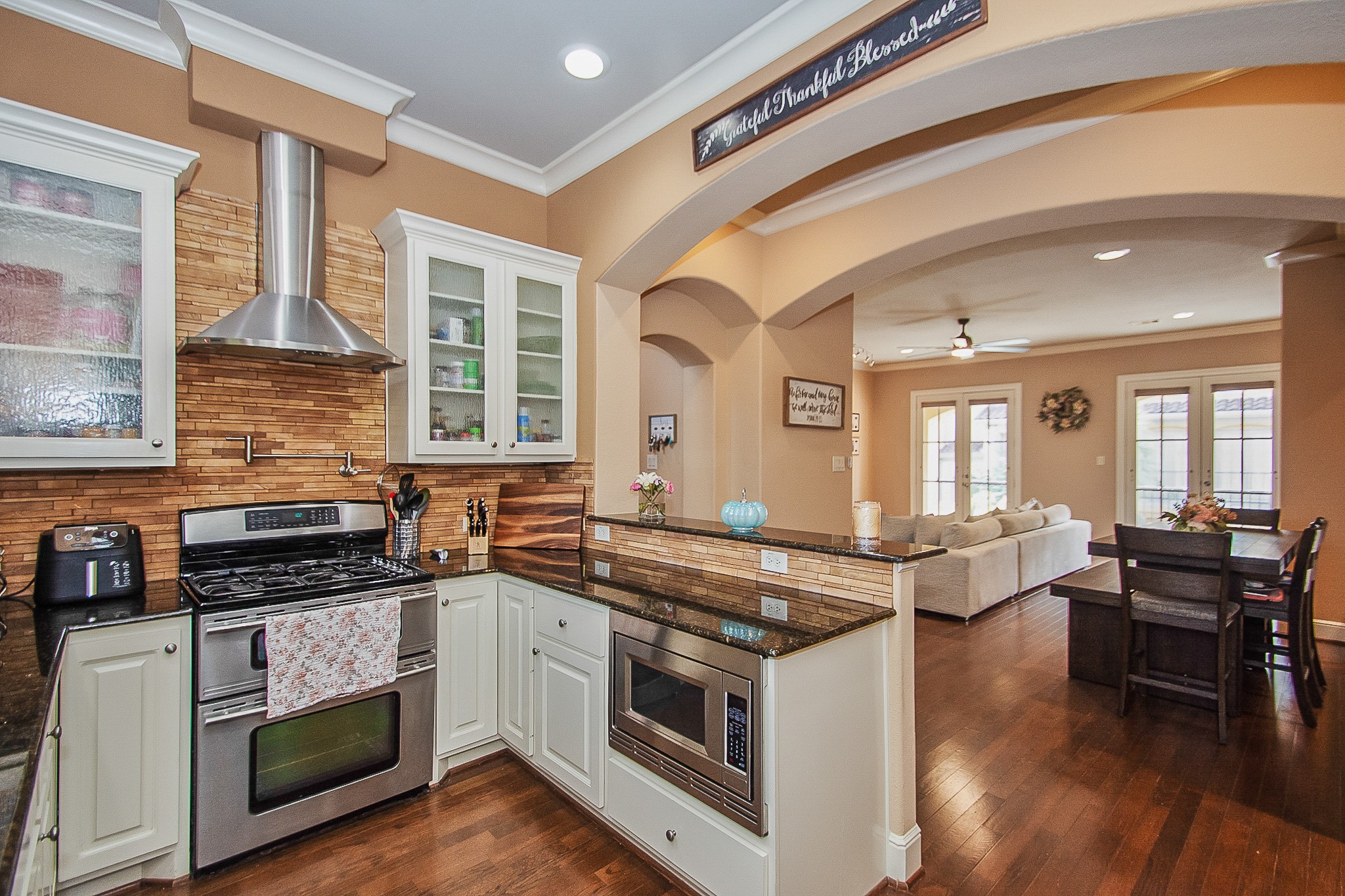Kitchen overlooking the living and dining areas