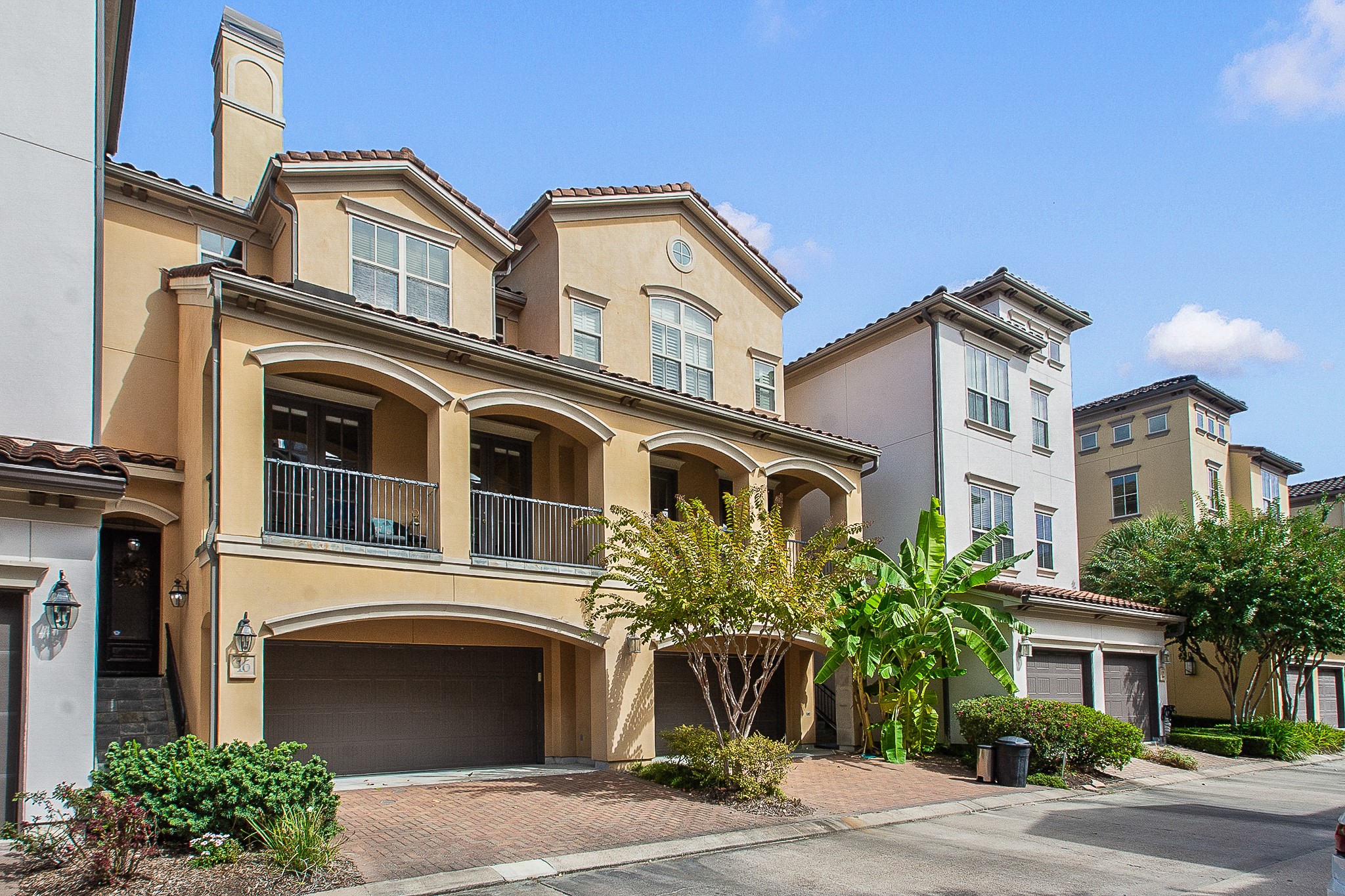 Feel the Mediterranean vibe from the driveway pavers to the clay tiled roof, and everything in between
