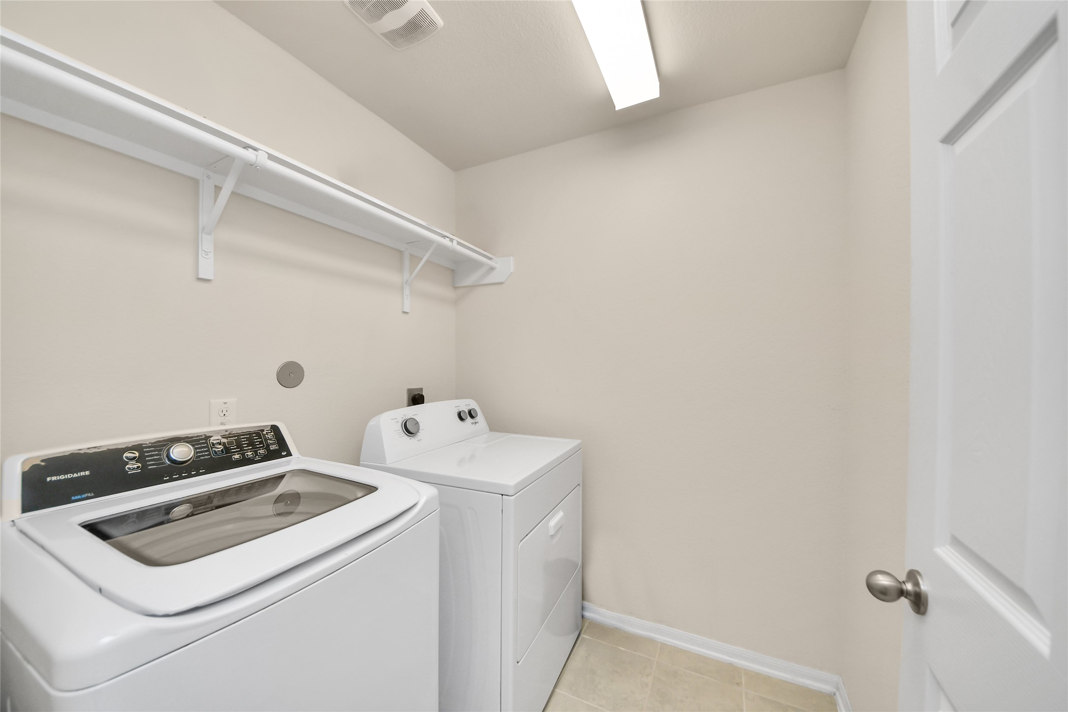 Laundry room, located upstairs.