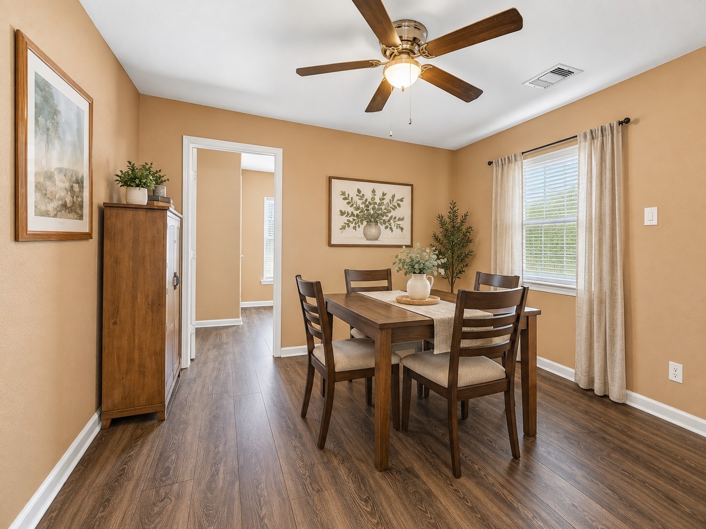 This flexible dining space flows easily off the kitchen, offering the perfect spot for morning coffee or evening meals together.