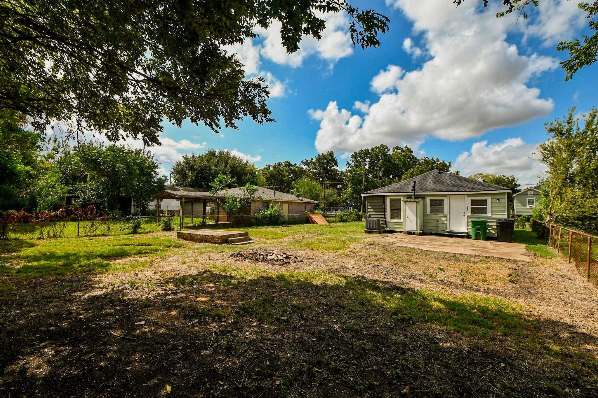 Enjoy the outdoors in your own backyard, offering space to unwind, garden, or create your favorite outdoor moments.