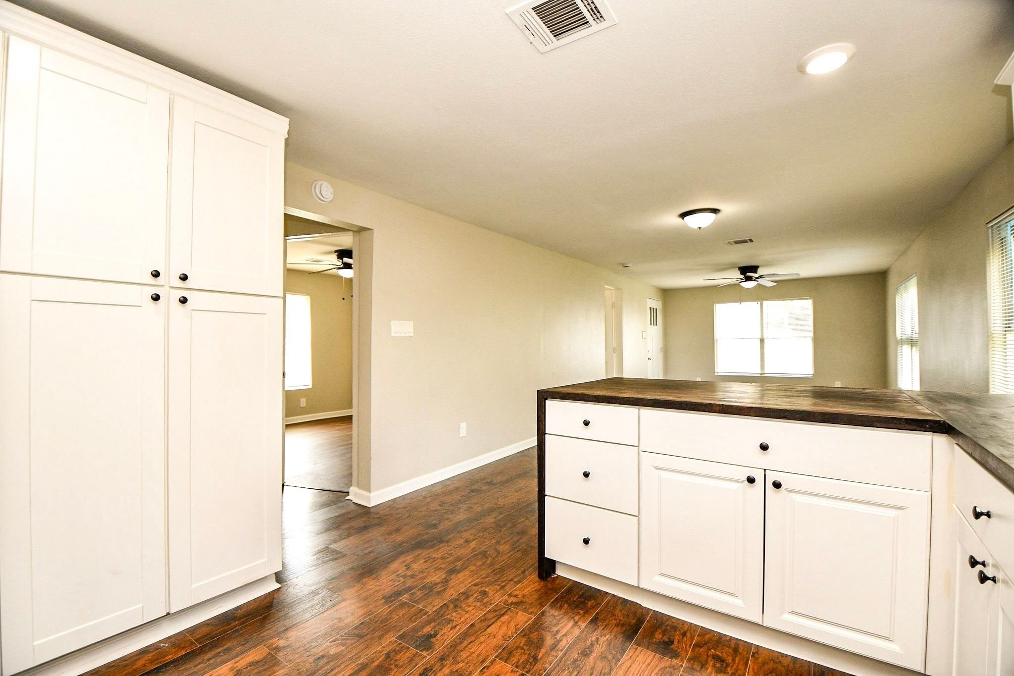Ample cabinetry provides extra storage for your cookware and kitchen essentials.