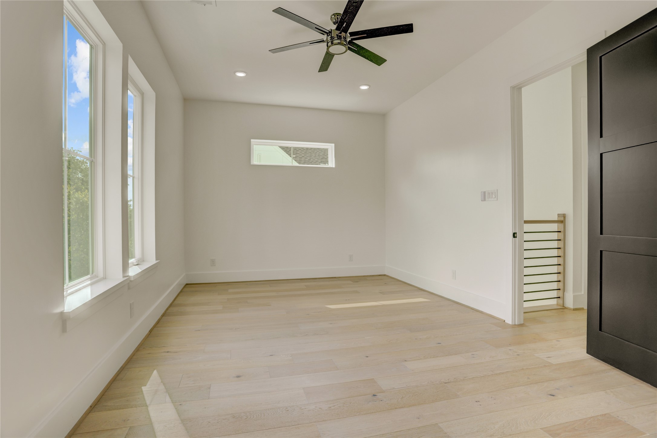 An additional third-floor suite is located opposite the primary space.