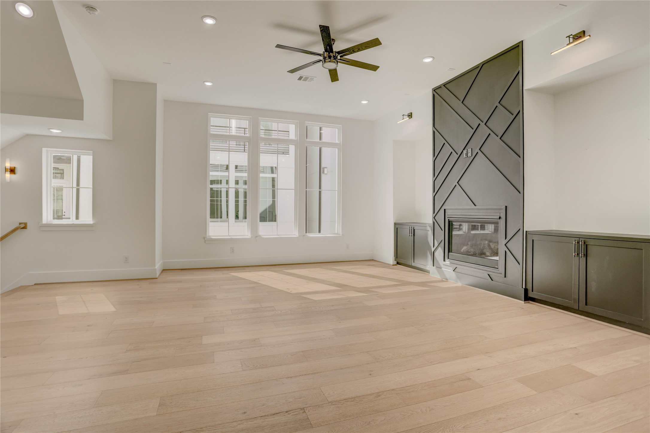 The second floor living area is showered in natural light and offers magnificent focal points and size.