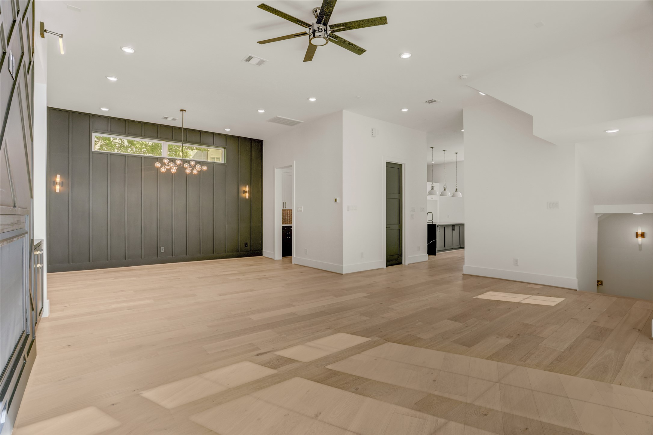 Another view of the living area with the dining room in the background.
