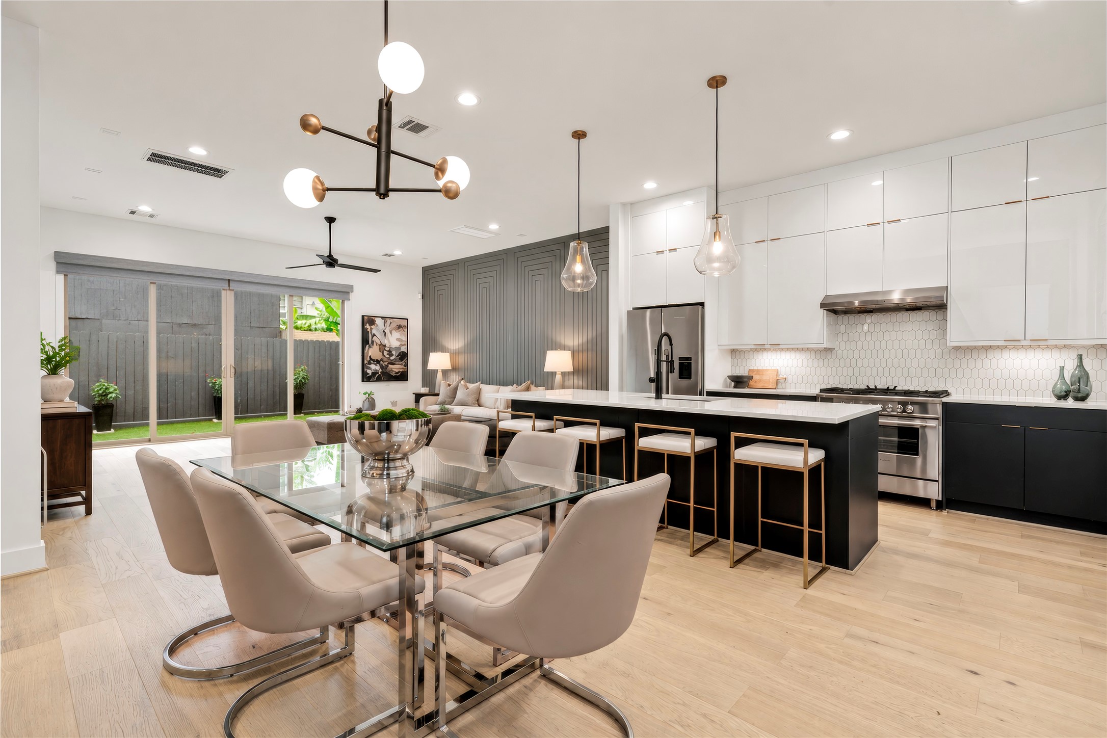 Amazing open concept style!  Kitchen, dining room and living room all adjacent to each other for seamless flow.  7.5" white oak engineered flooring throughout the first floor.  Virtually rendered.