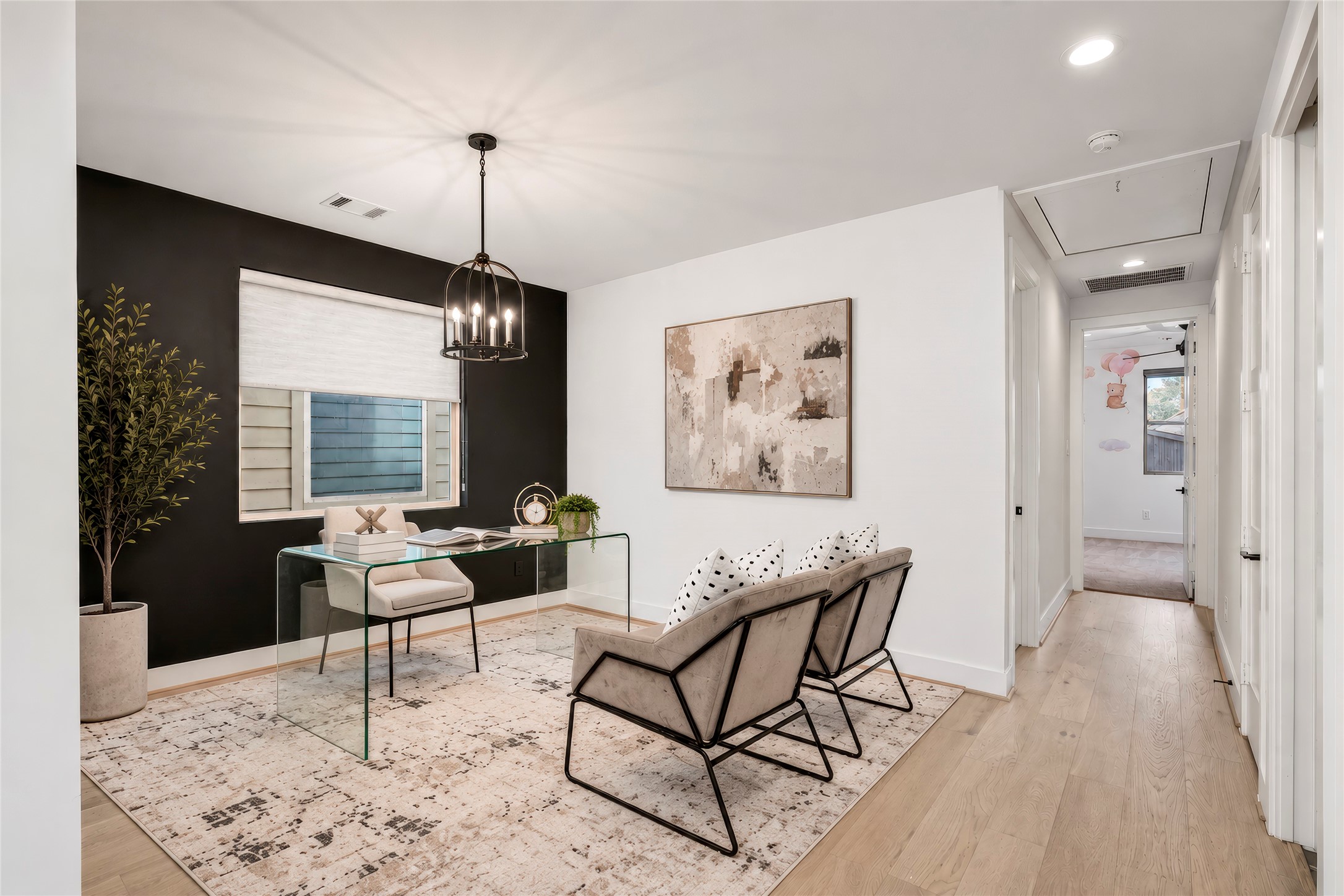 Home Office/Study or flex space for whatever you need it to be that fits your lifestyle.  Accent wall and custom shade on the window.  Designer lighting.  Engineered wood flooring.  Virtually rendered.