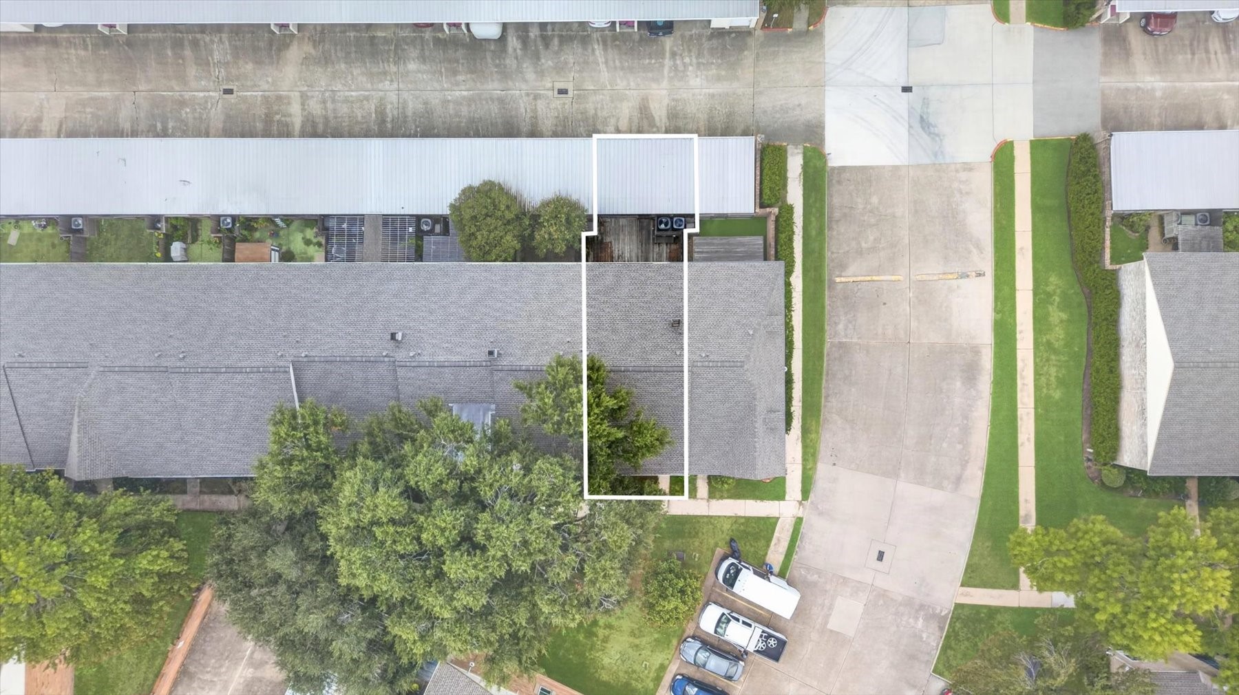Outlined area to show full space including covered carport.