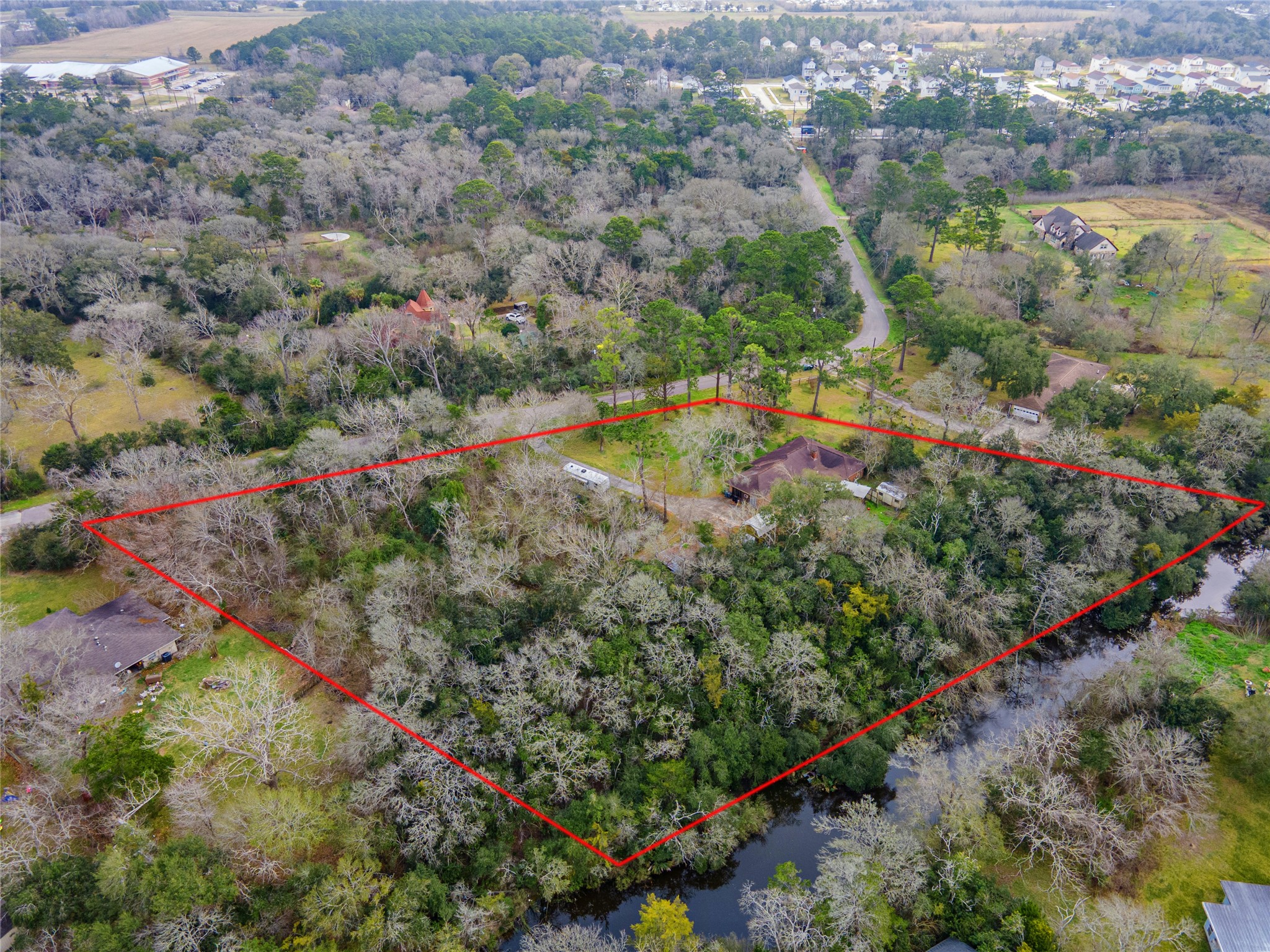 Just under 3 acre wooded lot on the bayou Just under 3 acre wooded lot on the bayou