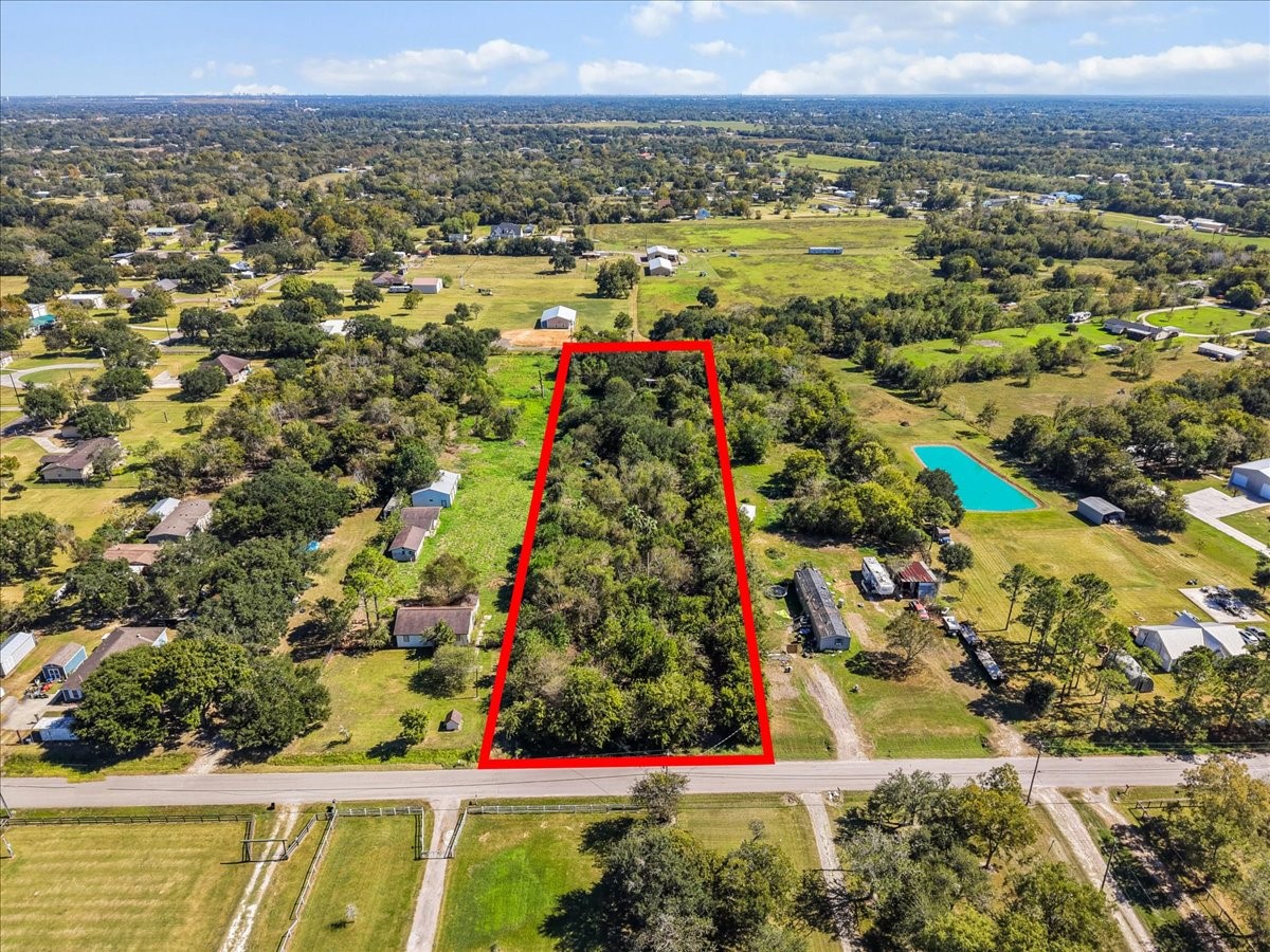 Welcome to the place for you to build your perfect dream home--5029 1/2 Ike Franks Rd. in Santa Fe, Texas! A 2+ acre parcel of Texas land--all for you to do as you wish.