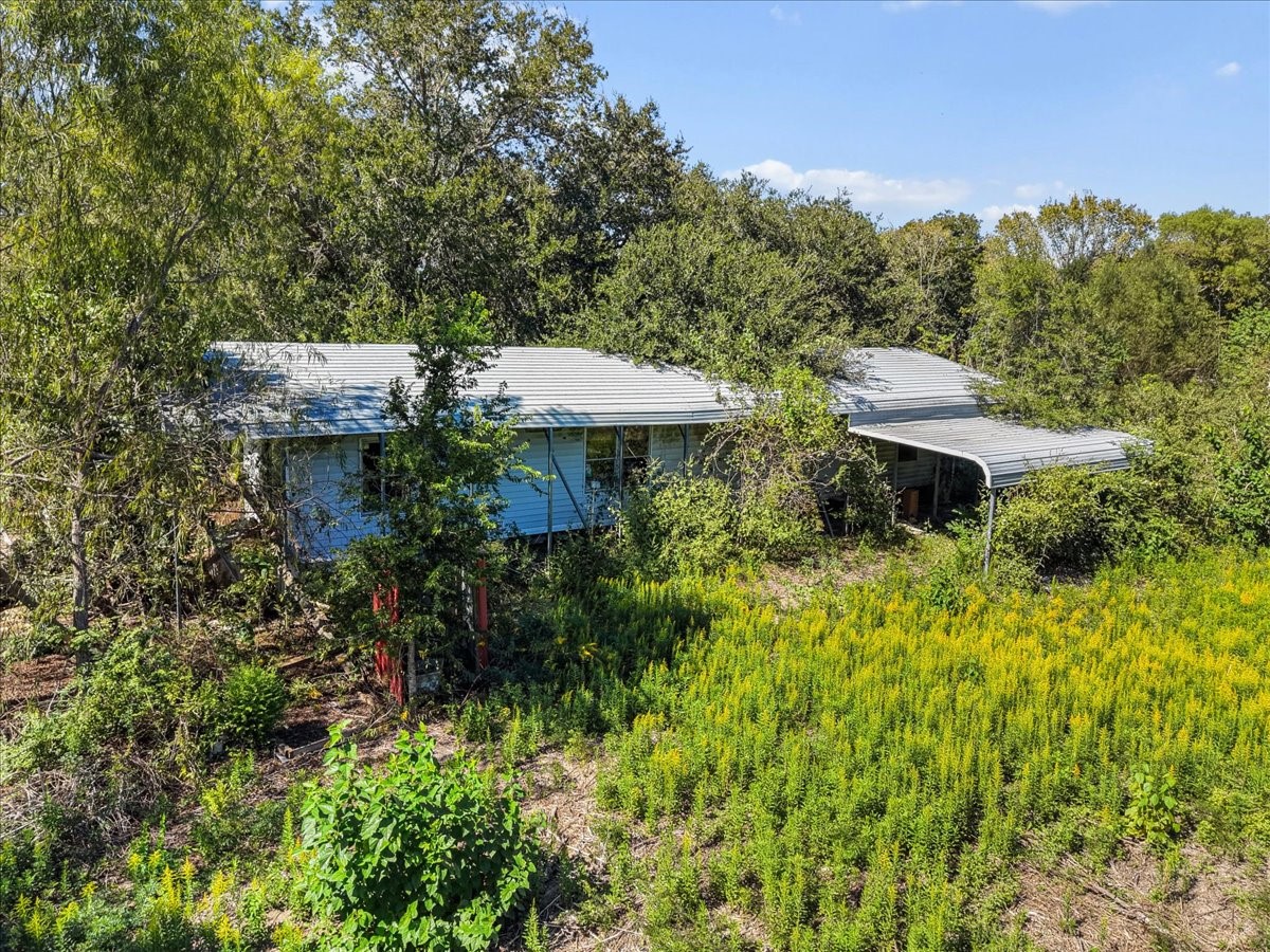 This manufactured home on the site is uninhabitable and will need to be razed. This is a land-only purchase. This manufactured home on the site is uninhabitable and will need to be razed. This is a land-only purchase.