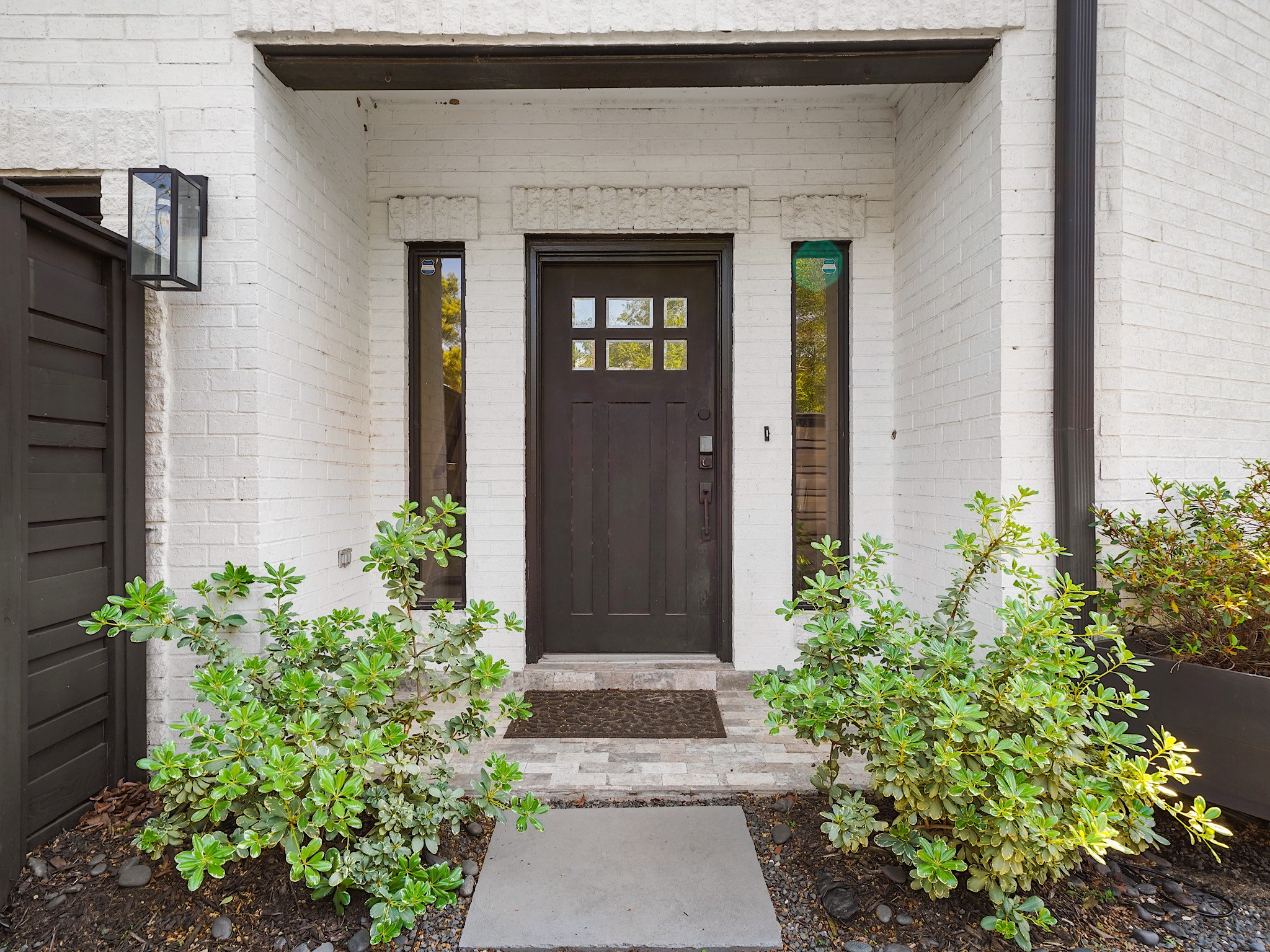 This charming front door warmly welcomes you, perfectly showcasing the home's unique style and inviting character. This charming front door warmly welcomes you, perfectly showcasing the home's unique style and inviting character.