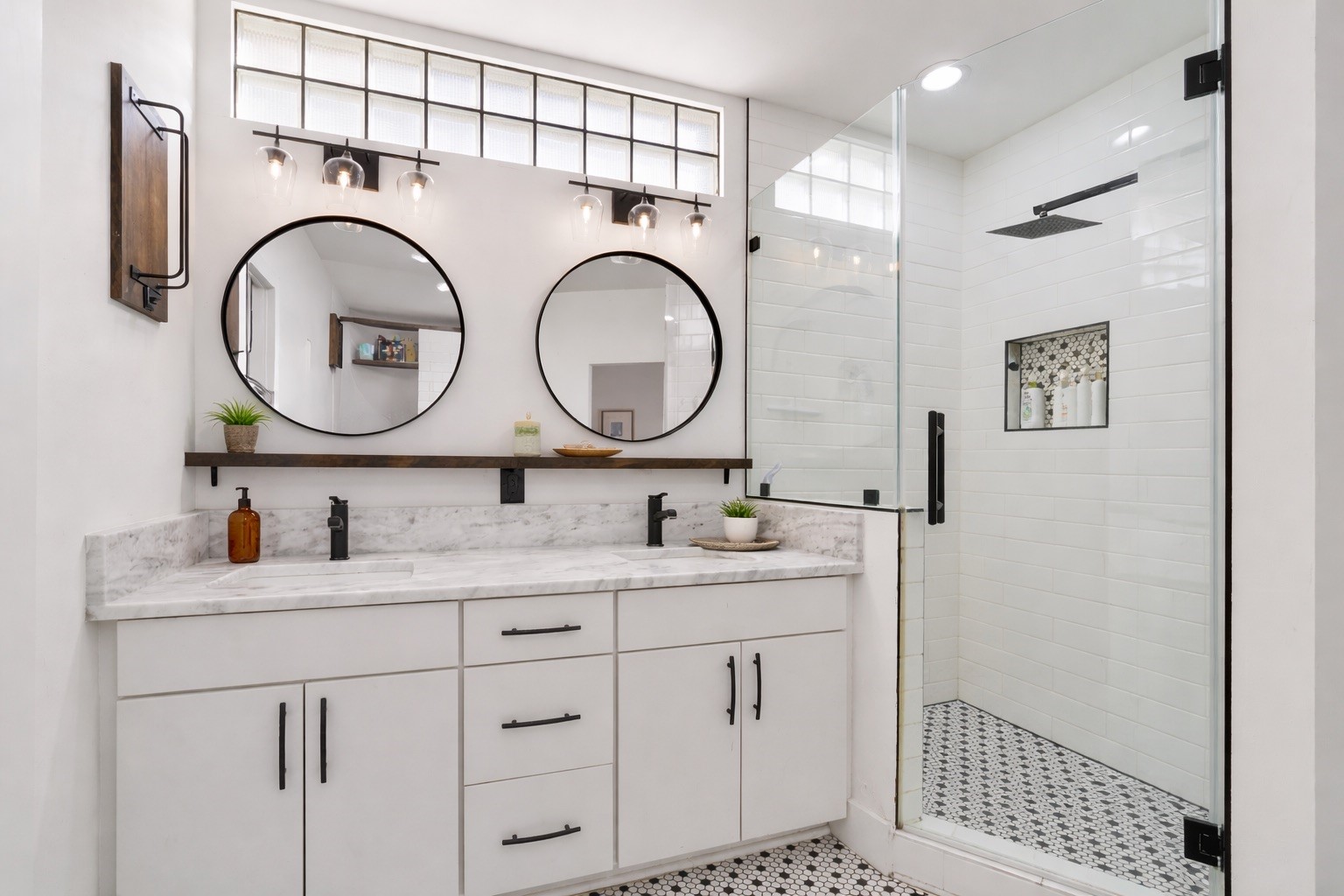 Experience sleek elegance with a modern standing shower, seamlessly blending clean lines and contemporary design for a stylish bathroom retreat.