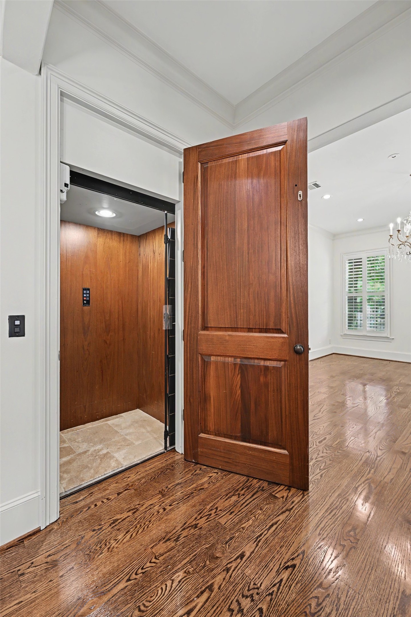 An elevator provides convenient access to all three floors of the home.