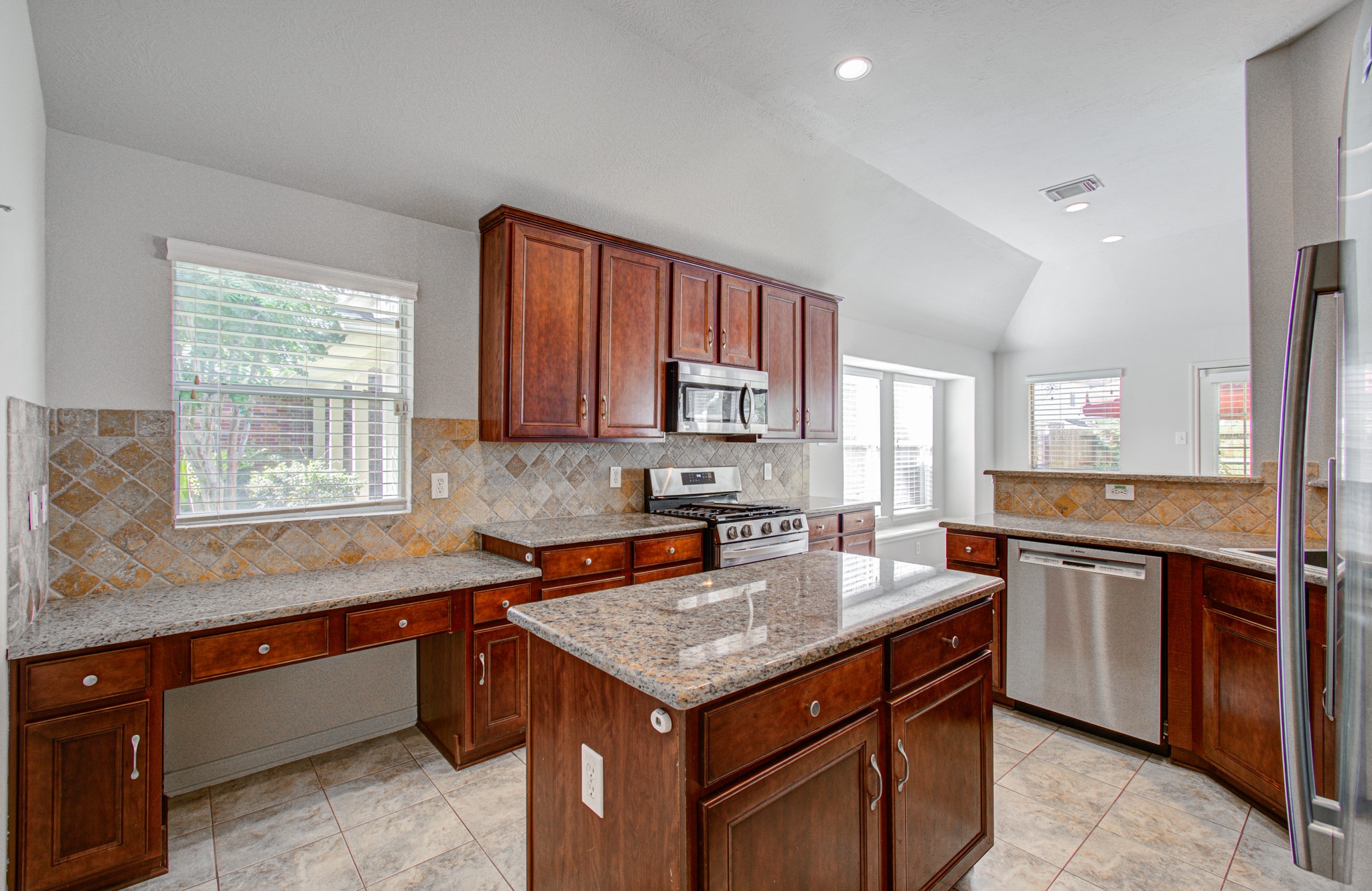 Another view of the kitchen showing the desk space in the kitchen.