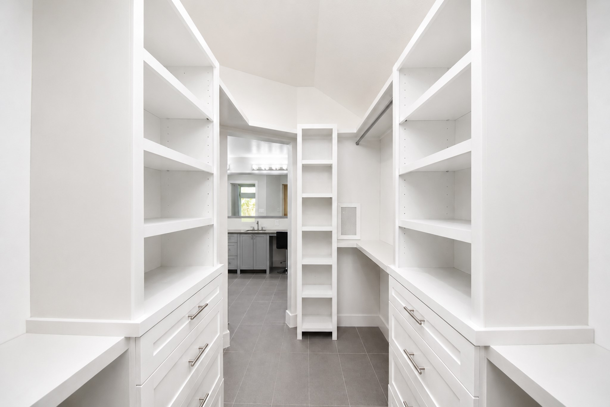 Primary bedroom closet virtually painted white
