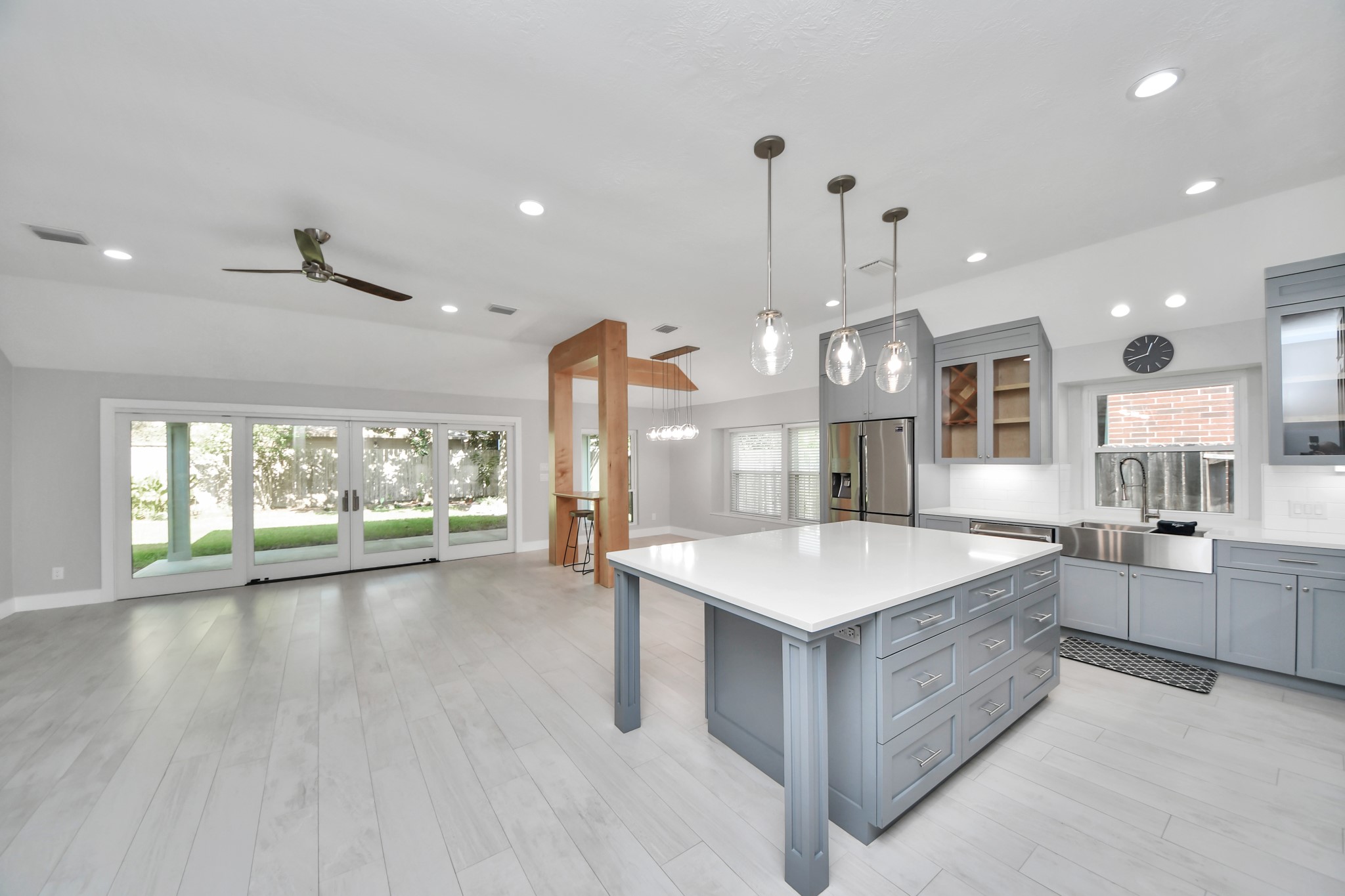 A chefs dream of a kitchen! Open concept and guaranteed to wow with soft closing custom solid wood cabinetry, Thermador 6 burner range, built in microwave, seamless quartz countertops, pendant lights and a vent hood to blow away all your steam.