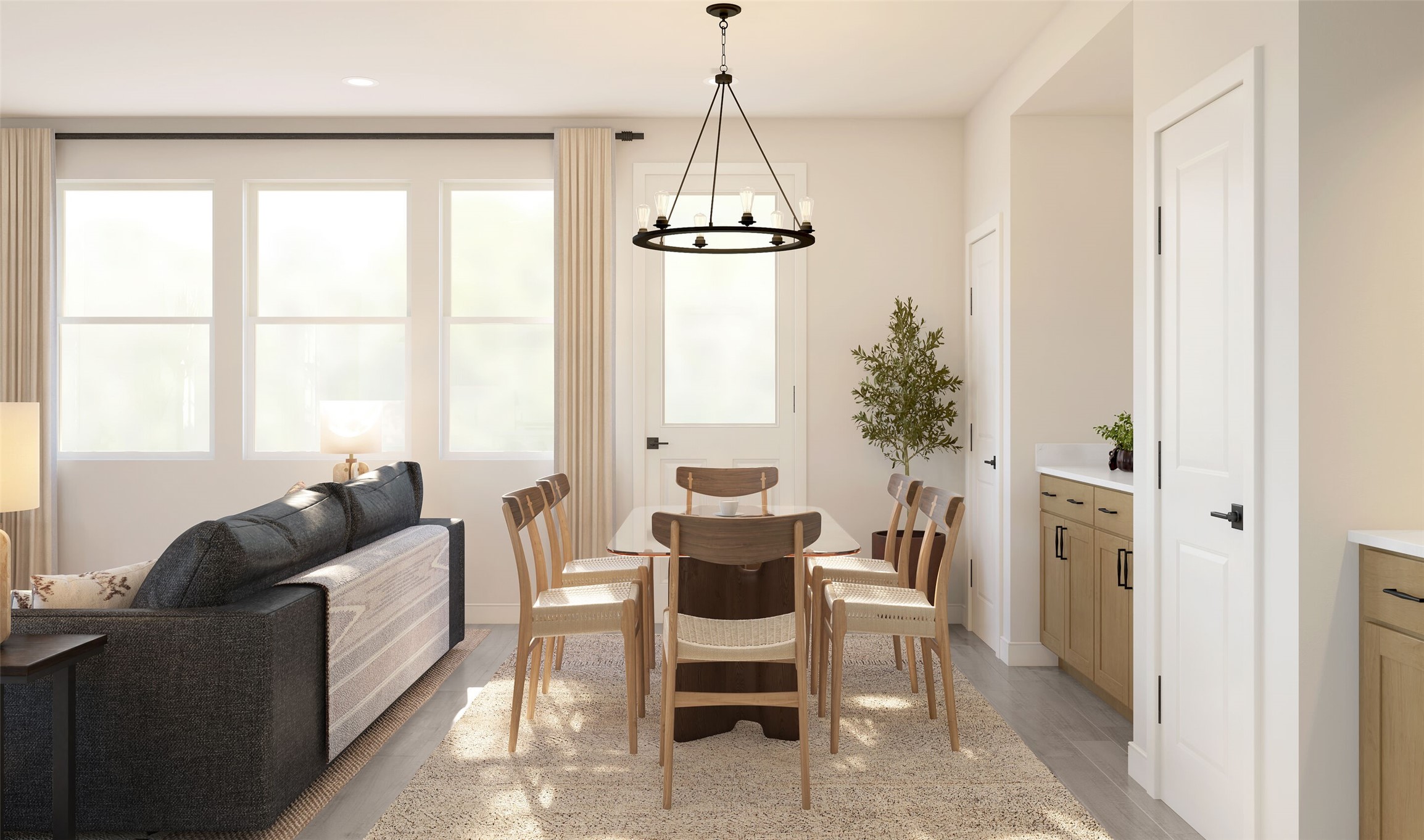Sun-lit dining area (*Artist rendering used for illustration purposes only. Colors/finishes may differ from the ones currently selected in the home.)