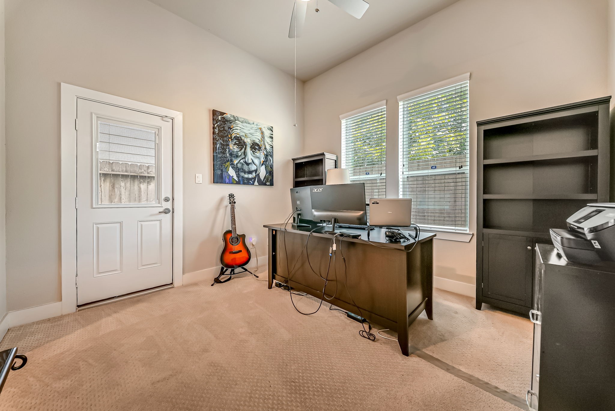 First-floor bedroom or office space offering privacy and versatility for today's work-from-home lifestyle.