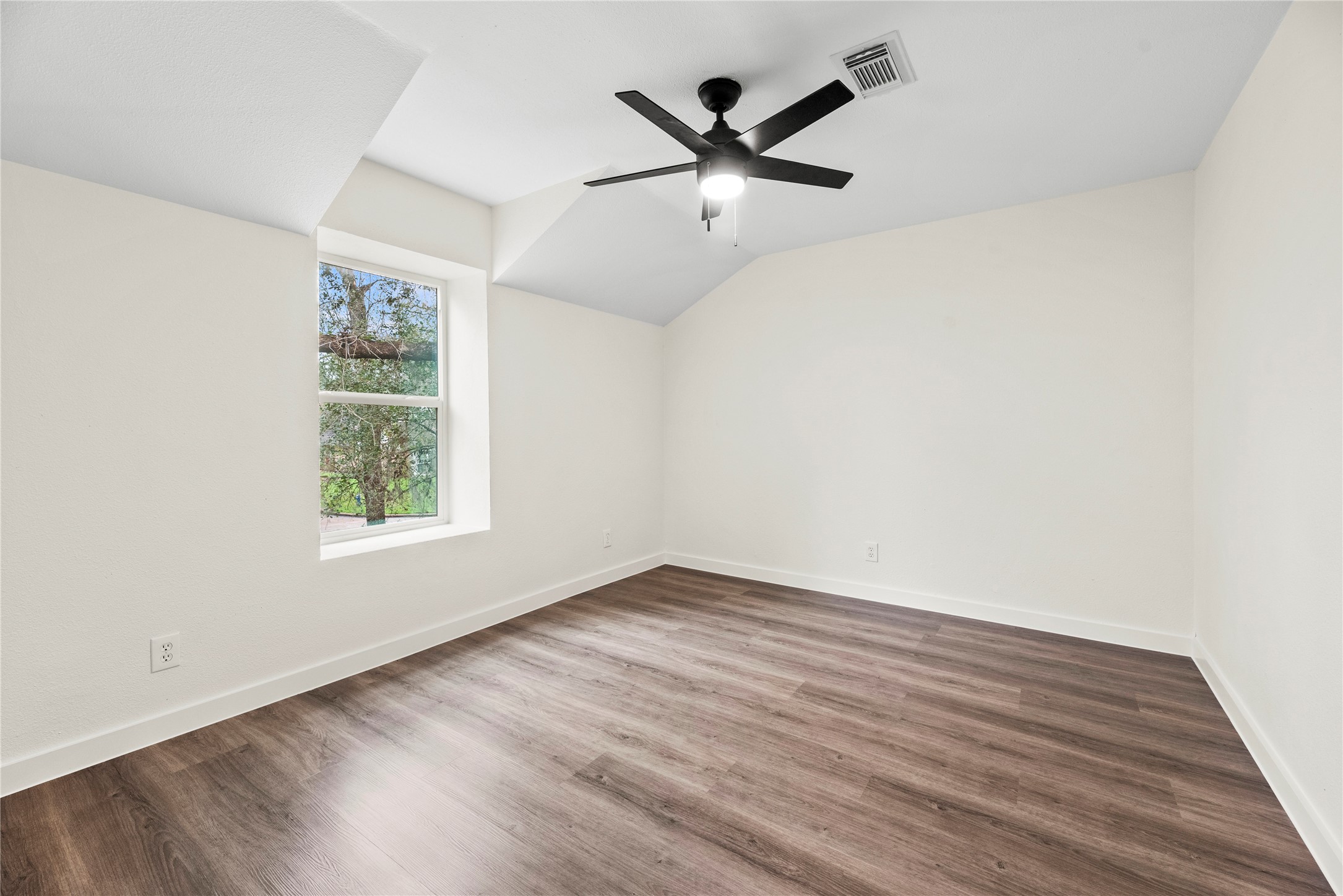 All upstairs secondary bedrooms include LVP flooring, ceiling fans and large closets.